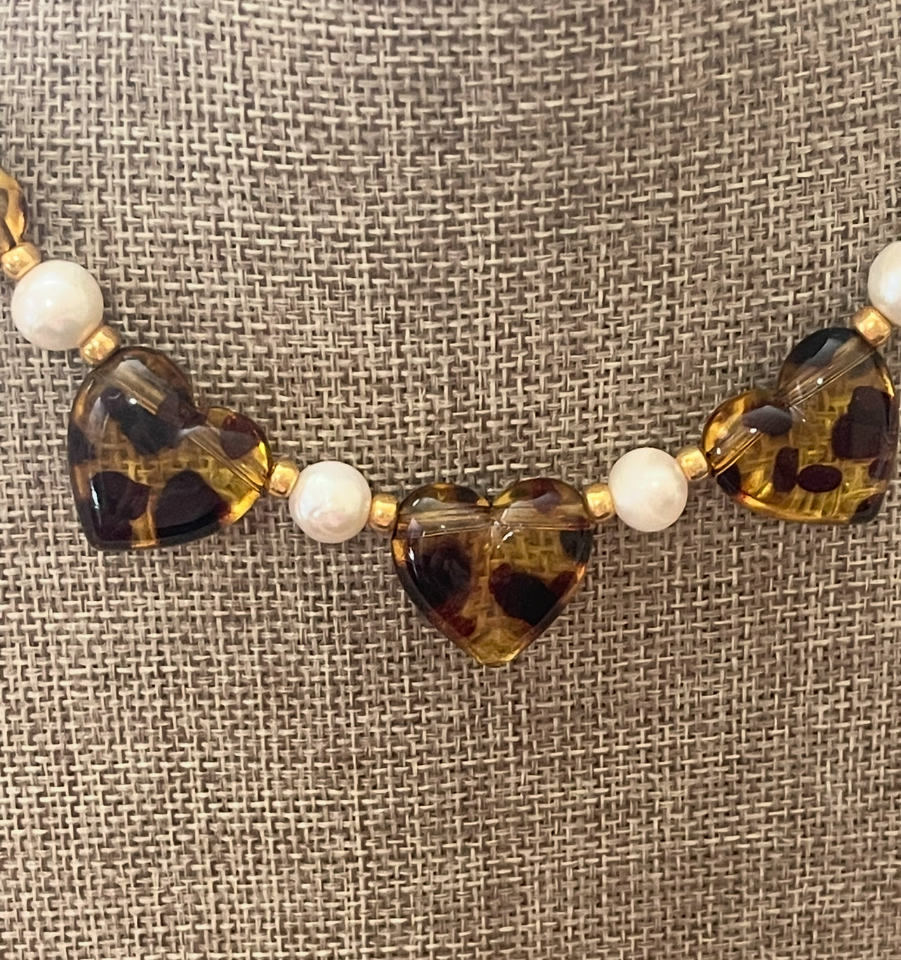 Leopard Love Necklace: Acrylic Leopard Print hearts with gold glass accent beads and Freshwater Pearls Gold Pavé toggle clasp