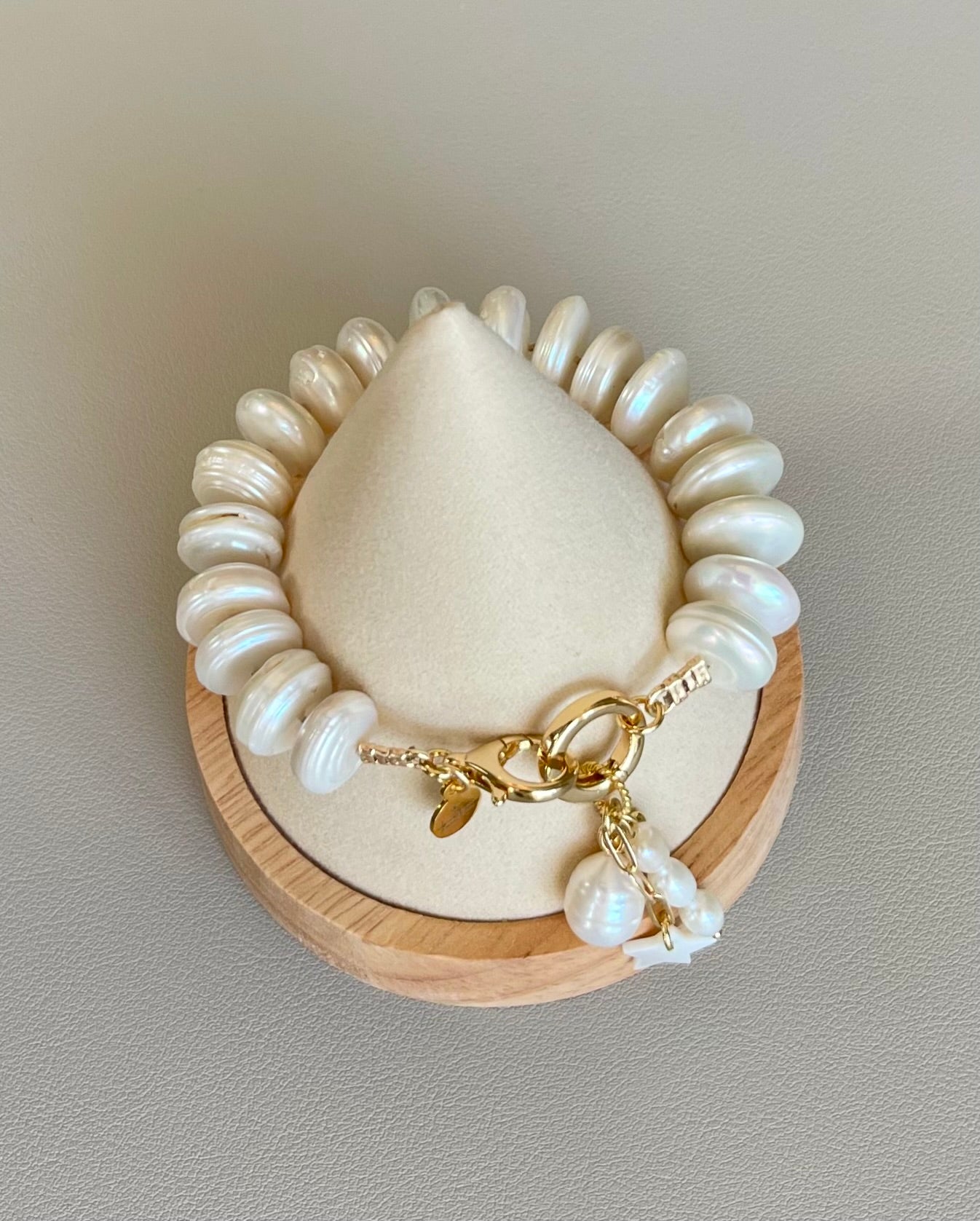 The Haven Bracelet: Coin shaped Pearls Hand-knotted on silk, Gold filled clasp/charm holder