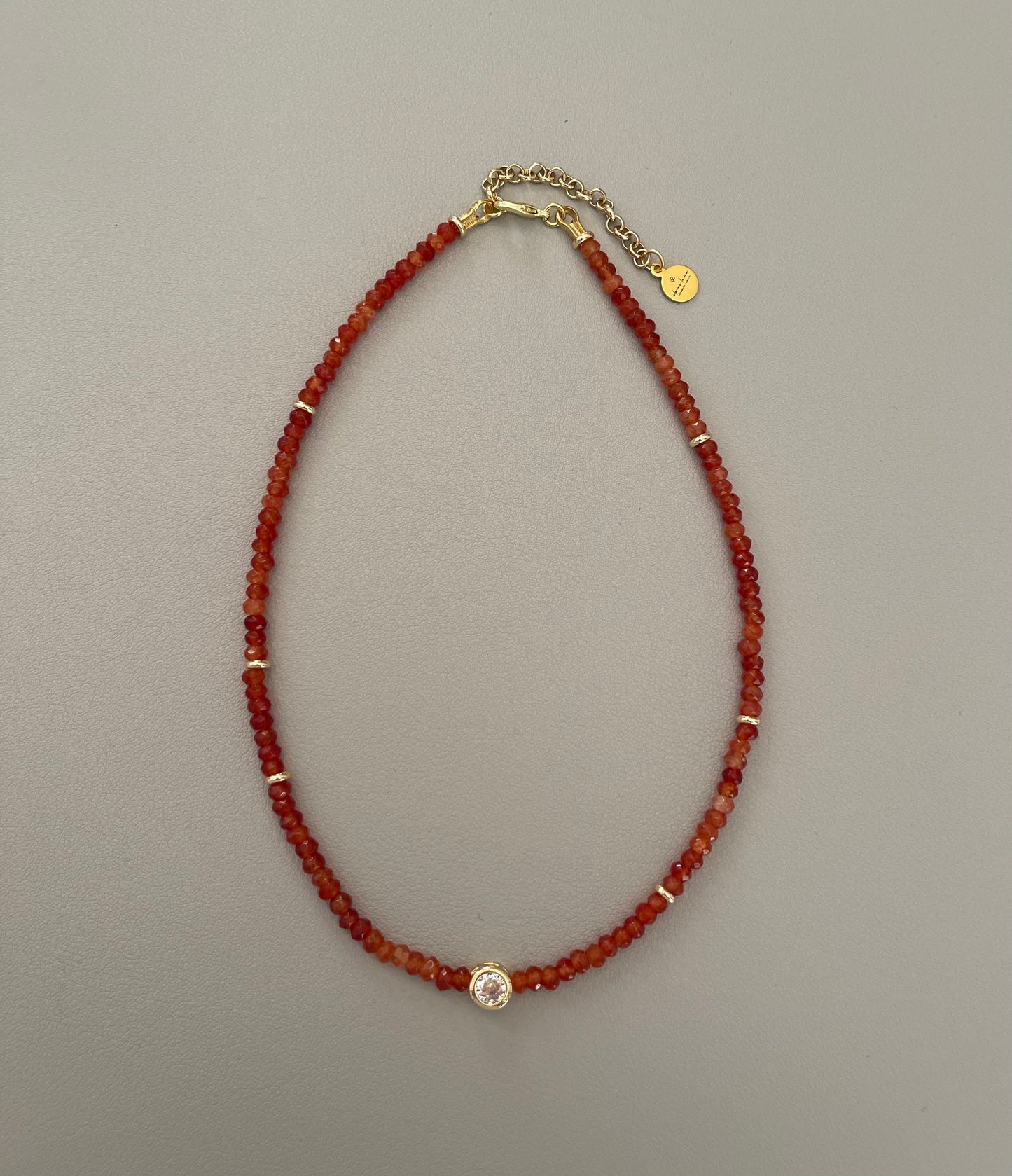 A Little Luxe Necklaces: Various natural stones in many colors, faceted, with a Bezel set Cubic Zirconia centerpiece