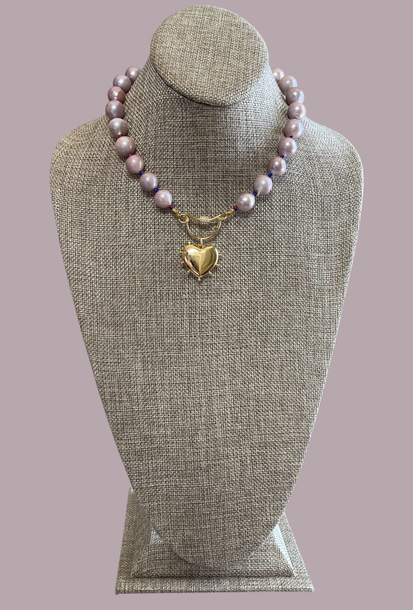 The Yves Necklace: Lavender Edison Pearls w/glass spacers, a gold crescent clasp holding a heart pendant OOAK