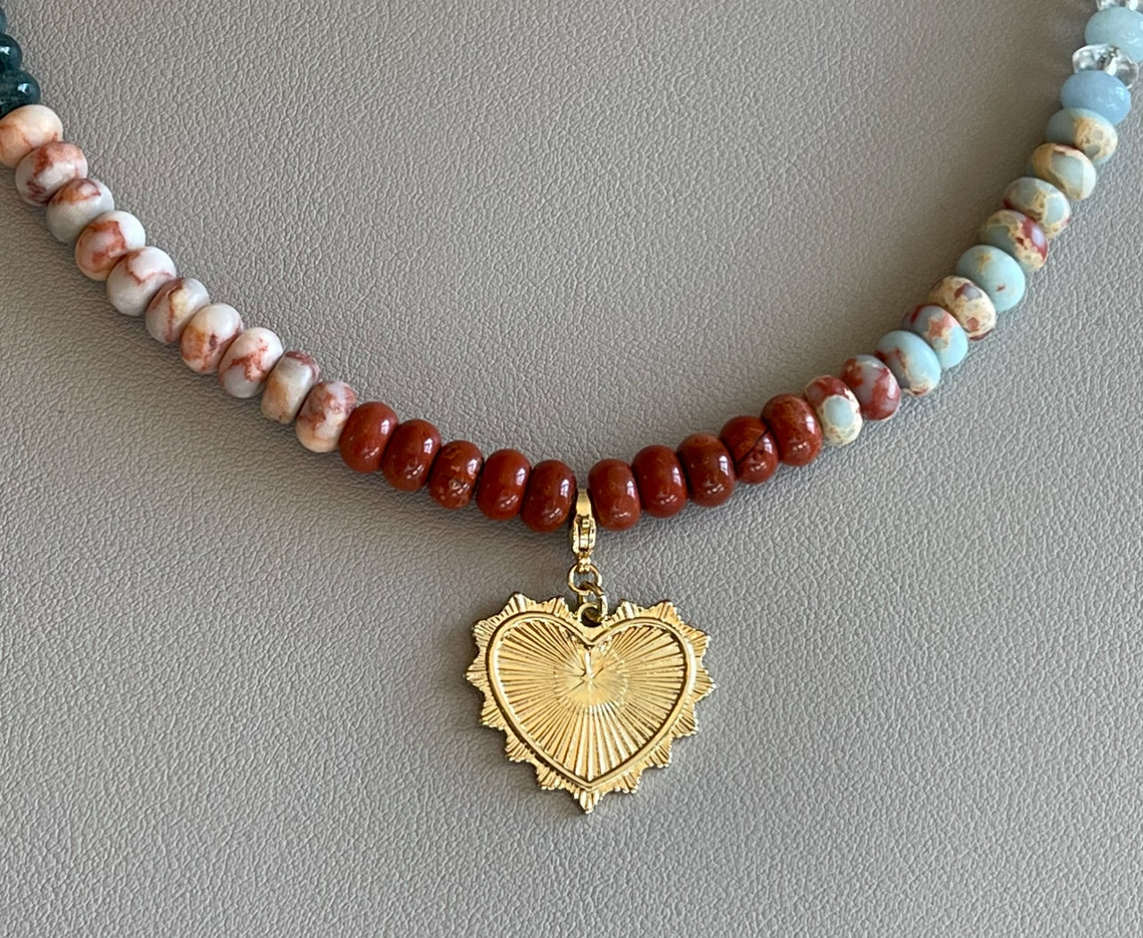 Earth & Sky Necklace: A blend of natural stones with a gold removable heart charm