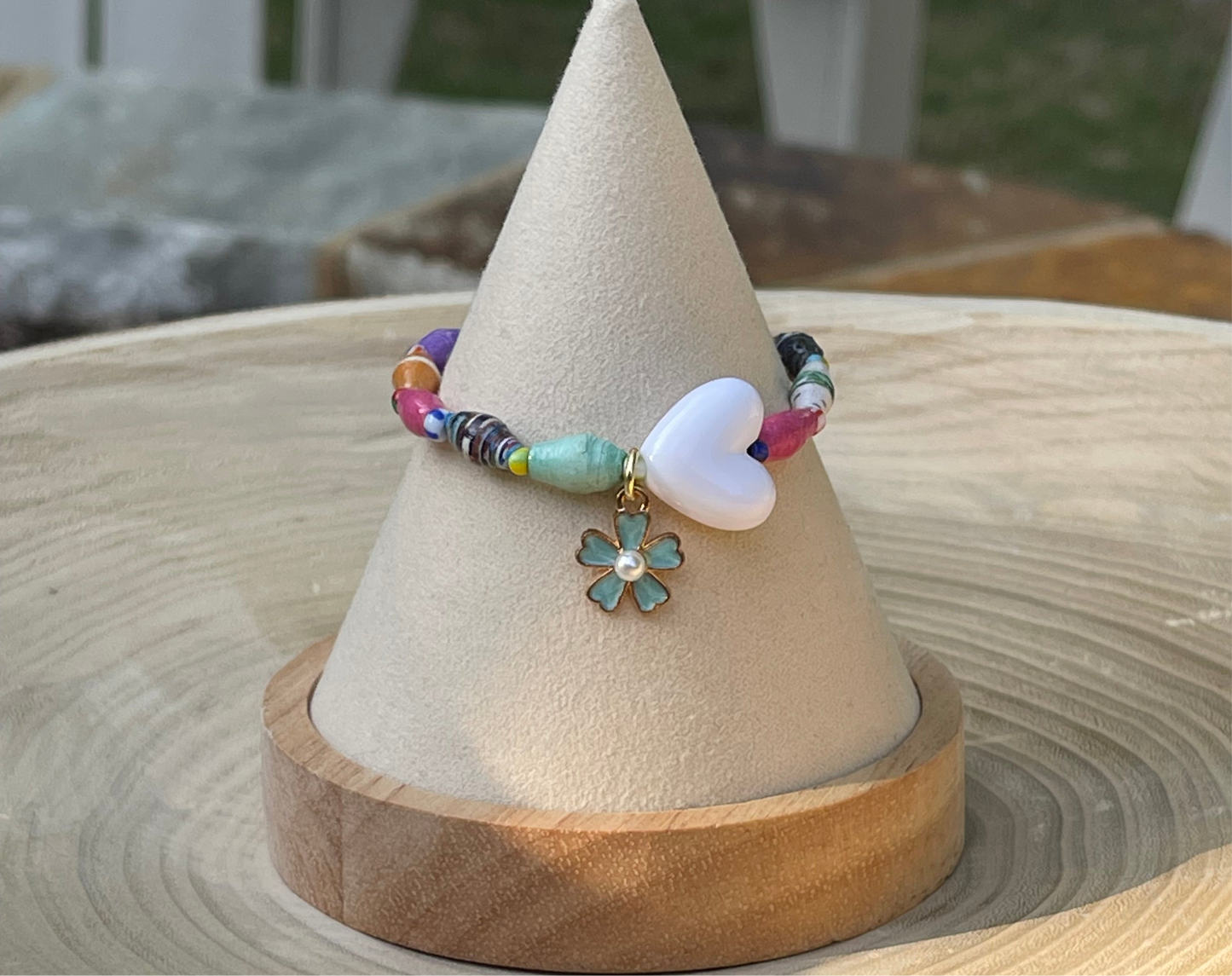 Kindred Colors Bracelet: Recycled paper bicone shaped beads, glass spacer beads, shiny white heart and flower charm