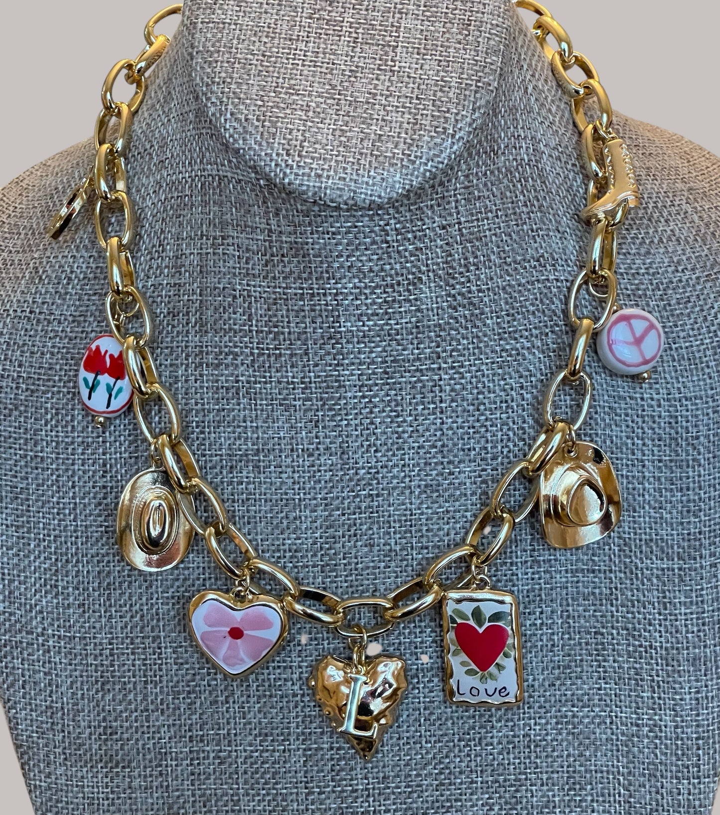 The Rachel Necklace: OOAK Thick gold chain w various fun gold plated charms in a pink and red theme
