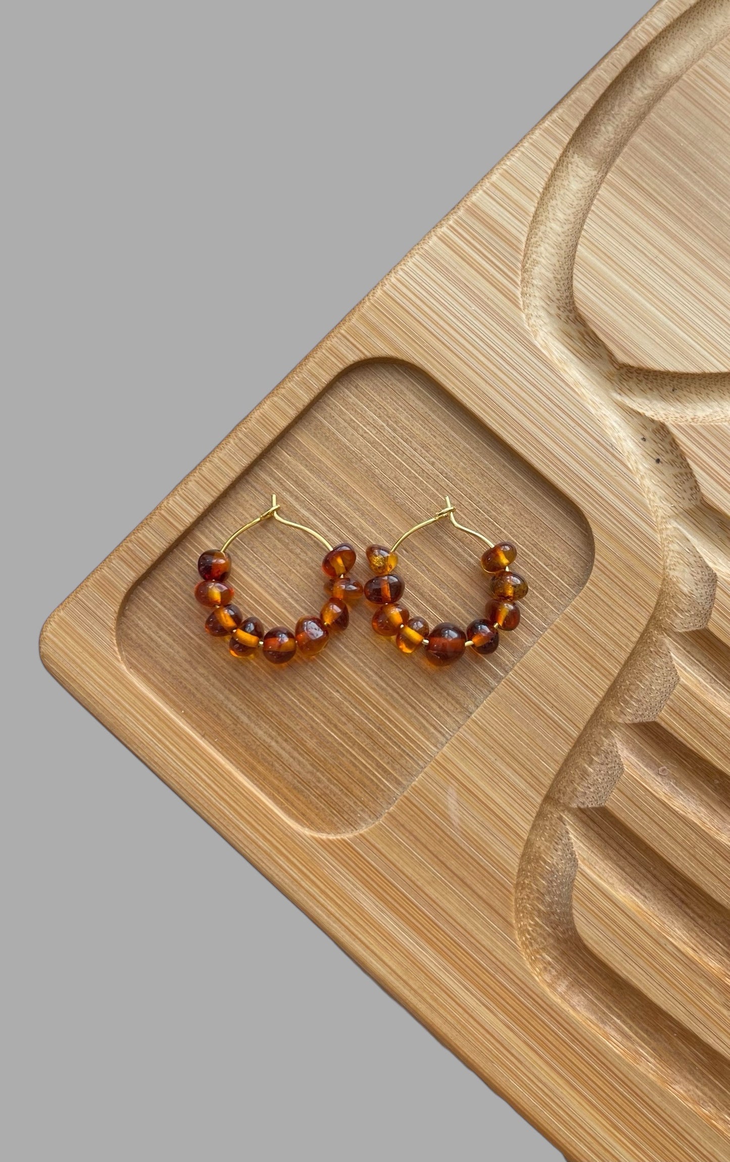 Amber Glow Earrings: Gold or Silver hoops with Baltic Amber Stones