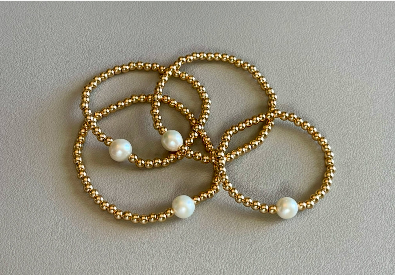 Everyday Hero Bracelet: Gold bead stretch bracelet with a freshwater pearl centerpiece Choose your size!