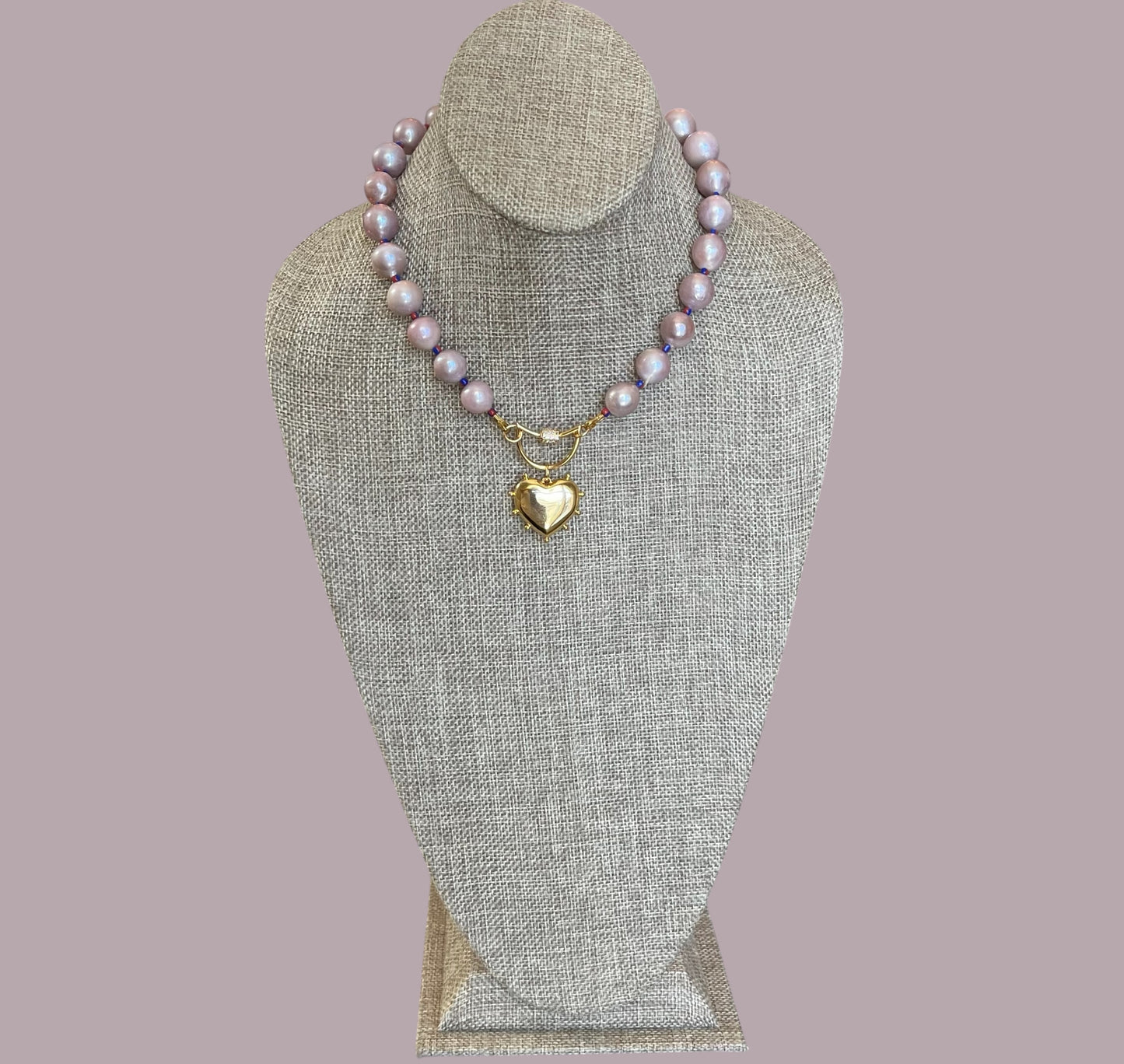 The Yves Necklace: Lavender Edison Pearls w/glass spacers, a gold crescent clasp holding a heart pendant OOAK