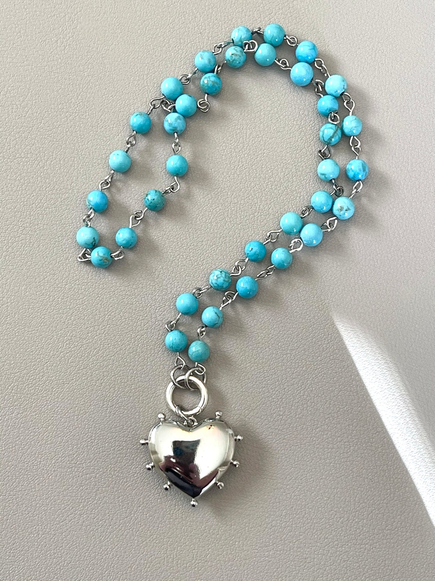 Rhodium Sky necklace: Turquoise Howlite bead rosary style chain Silver circle clasp/charm holder Rhodium silver plated heart pendant