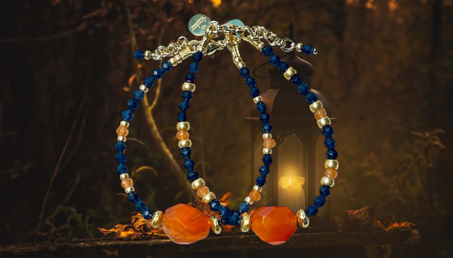Fire & Twilight Bracelet~ Very Limited Edition: Faceted Sapphire beads Gold accent beads and a faceted Carnelian Centerpiece