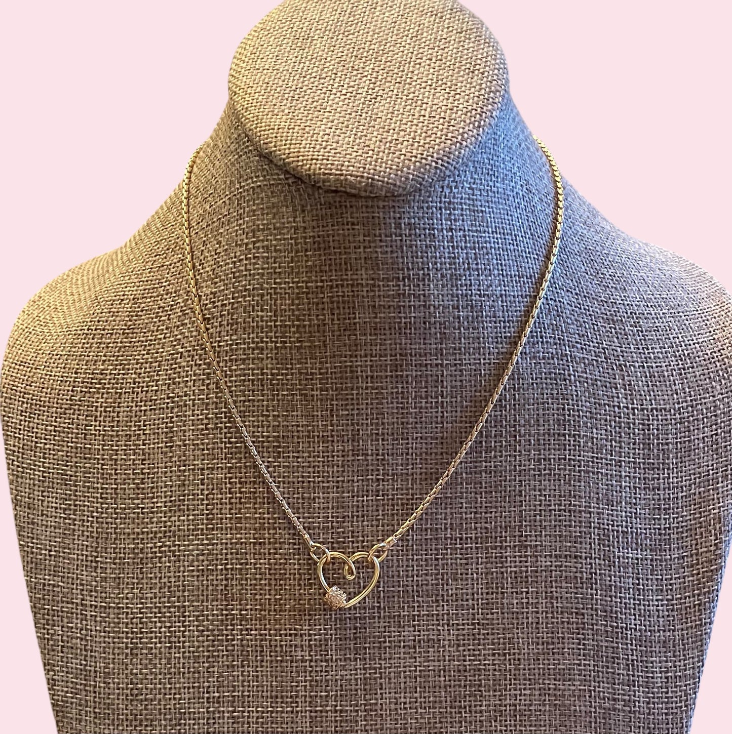 Be Still My Heart Necklace: A thin gold cable chain w/ an adorable heart that doubles as a clasp and a charm holder Pavé screw closure OOAK