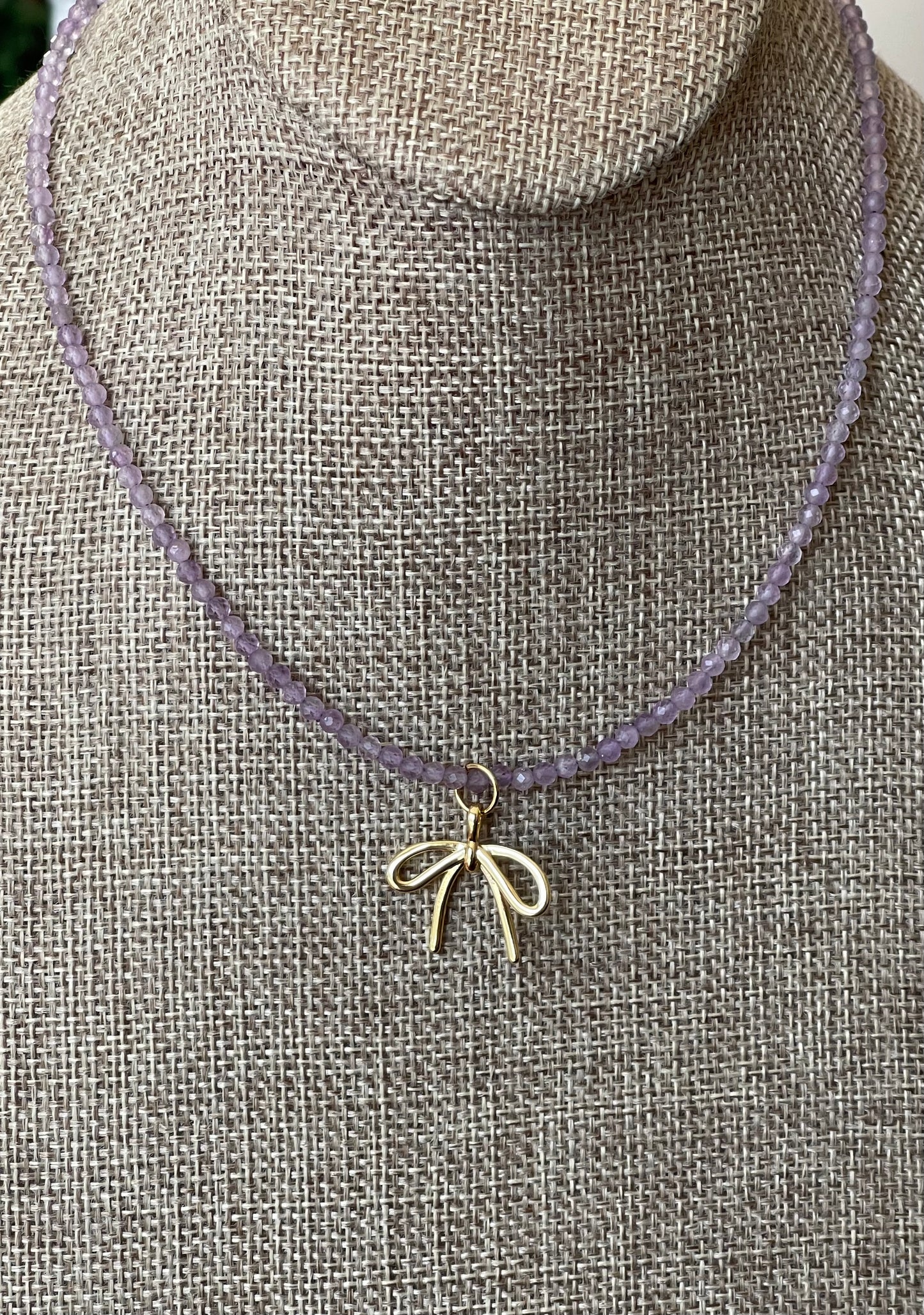The Amethyst Skinny: Faceted Amethyst gemstones with a bow charm in Gold or Silver