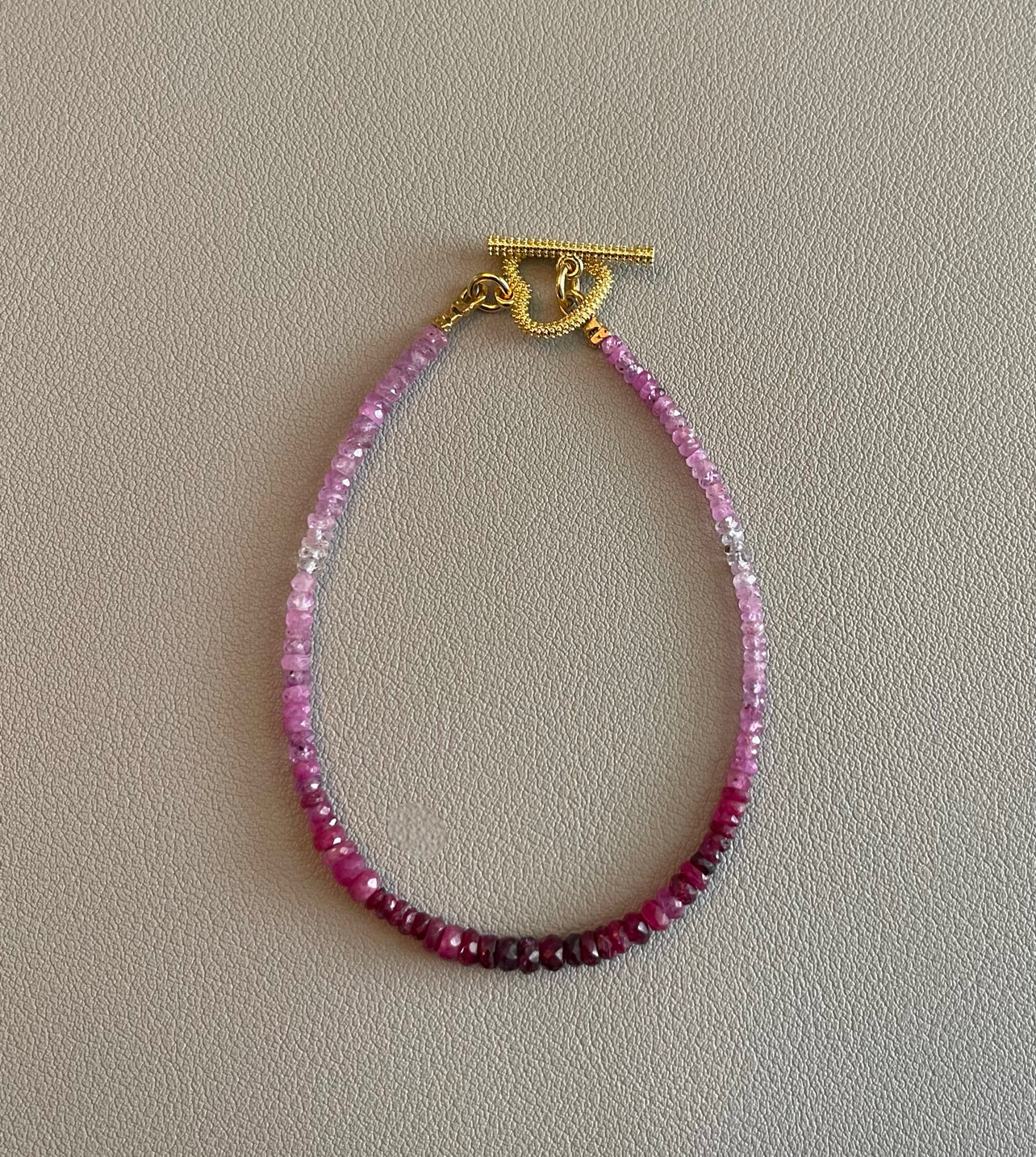 Gradient Ruby Bracelet: Genuine Ruby gemstones Textured gold heart toggle clasp OOAK