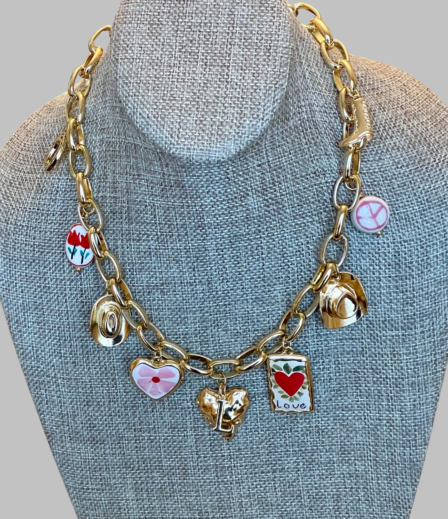 The Rachel Necklace: OOAK Thick gold chain w various fun gold plated charms in a pink and red theme