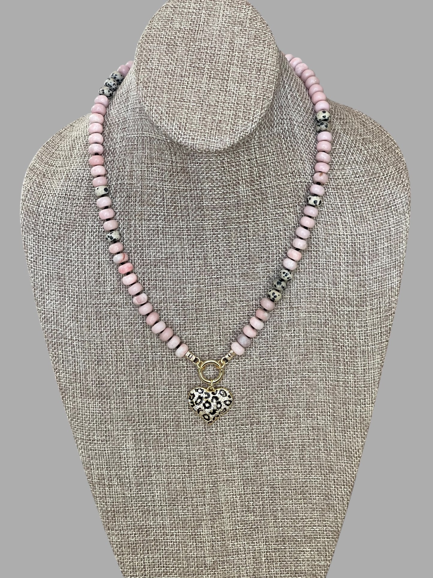 The Pink Leopard Necklace: Natural matte pink opals hand knotted on black silk w Dalmatian Jasper accents Gold pavé leopard heart OOAK