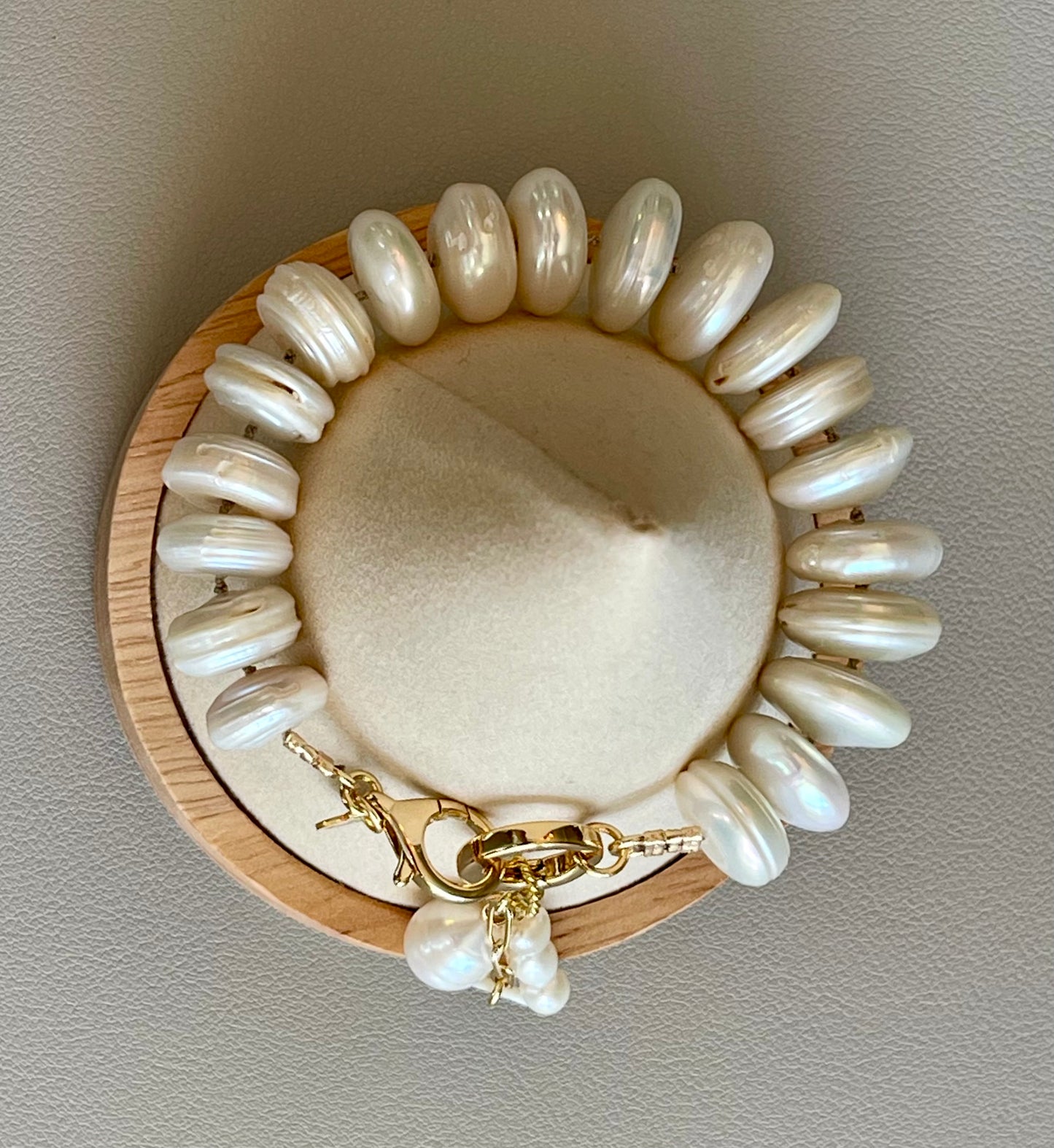 The Haven Bracelet: Coin shaped Pearls Hand-knotted on silk, Gold filled clasp/charm holder