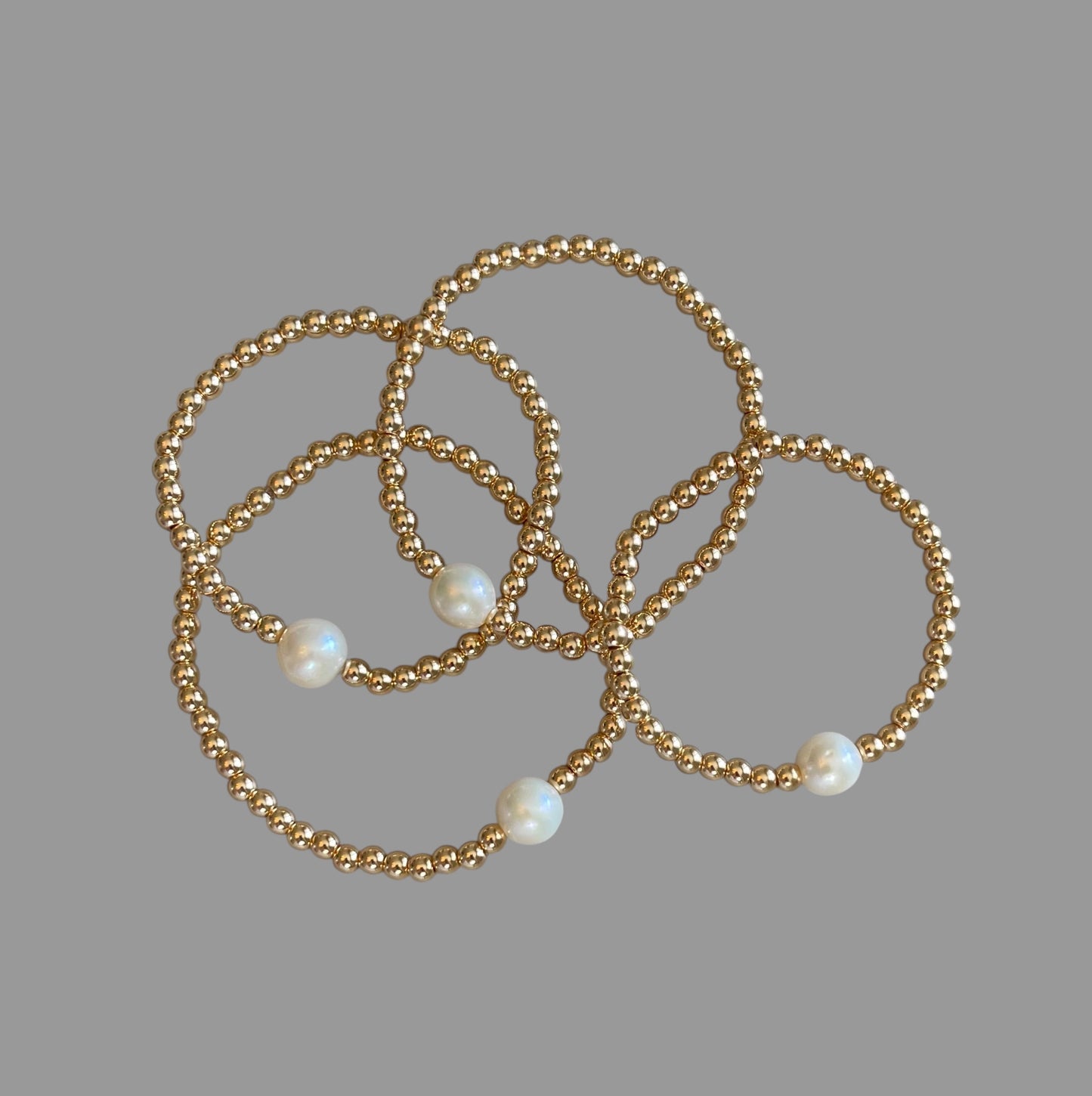 Everyday Hero Bracelet: Gold bead stretch bracelet with a freshwater pearl centerpiece Choose your size!
