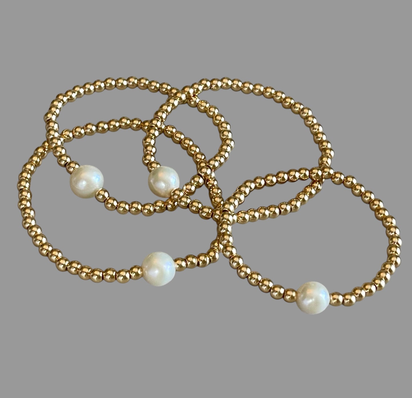 Everyday Hero Bracelet: Gold bead stretch bracelet with a freshwater pearl centerpiece Choose your size!