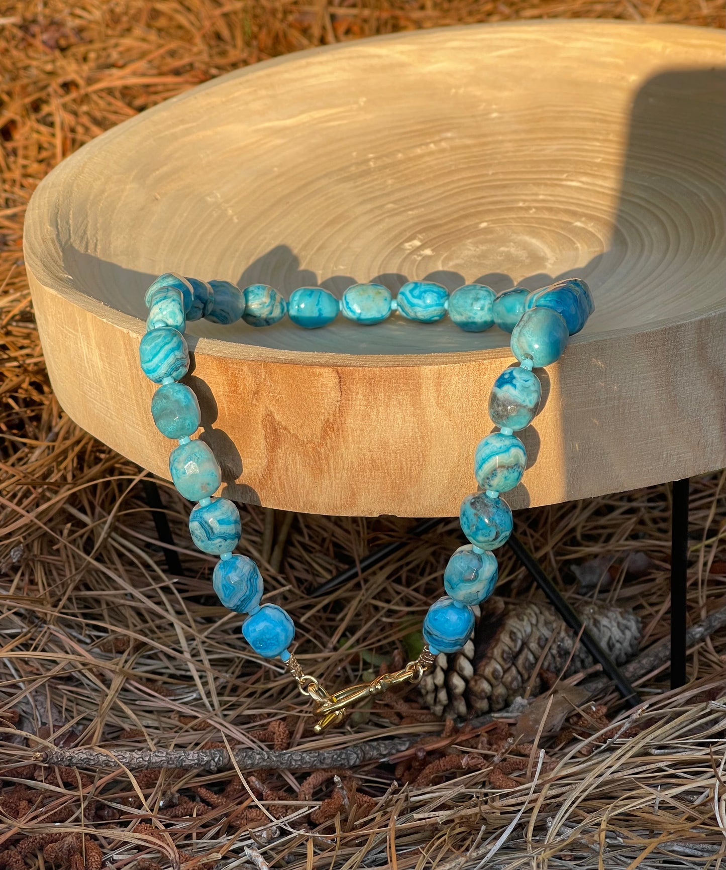 Cerulean Lace Necklace: Faceted Crazy Lace Agate with a deep gold luxe toggle clasp