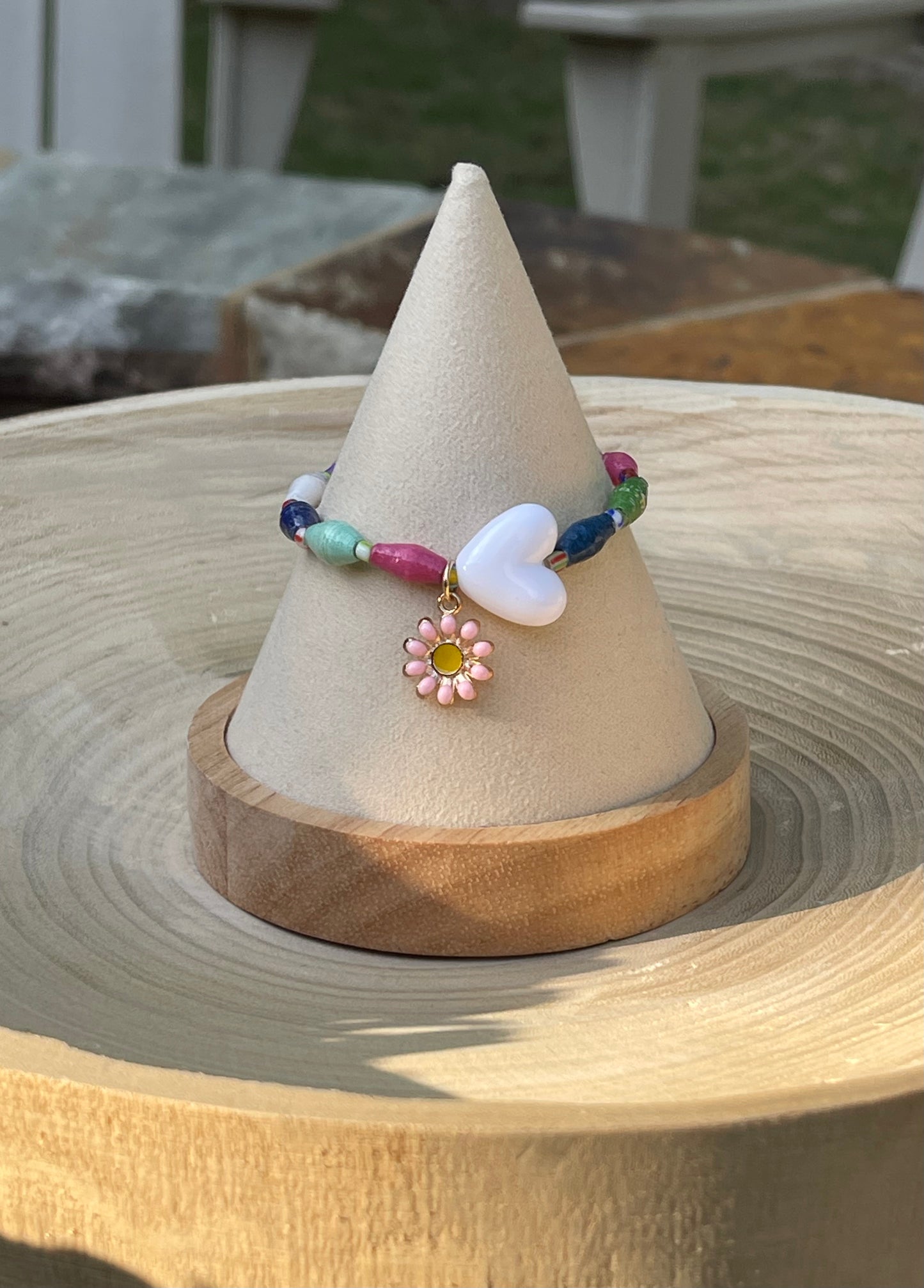 Kindred Colors Bracelet: Recycled paper bicone shaped beads, glass spacer beads, shiny white heart and flower charm
