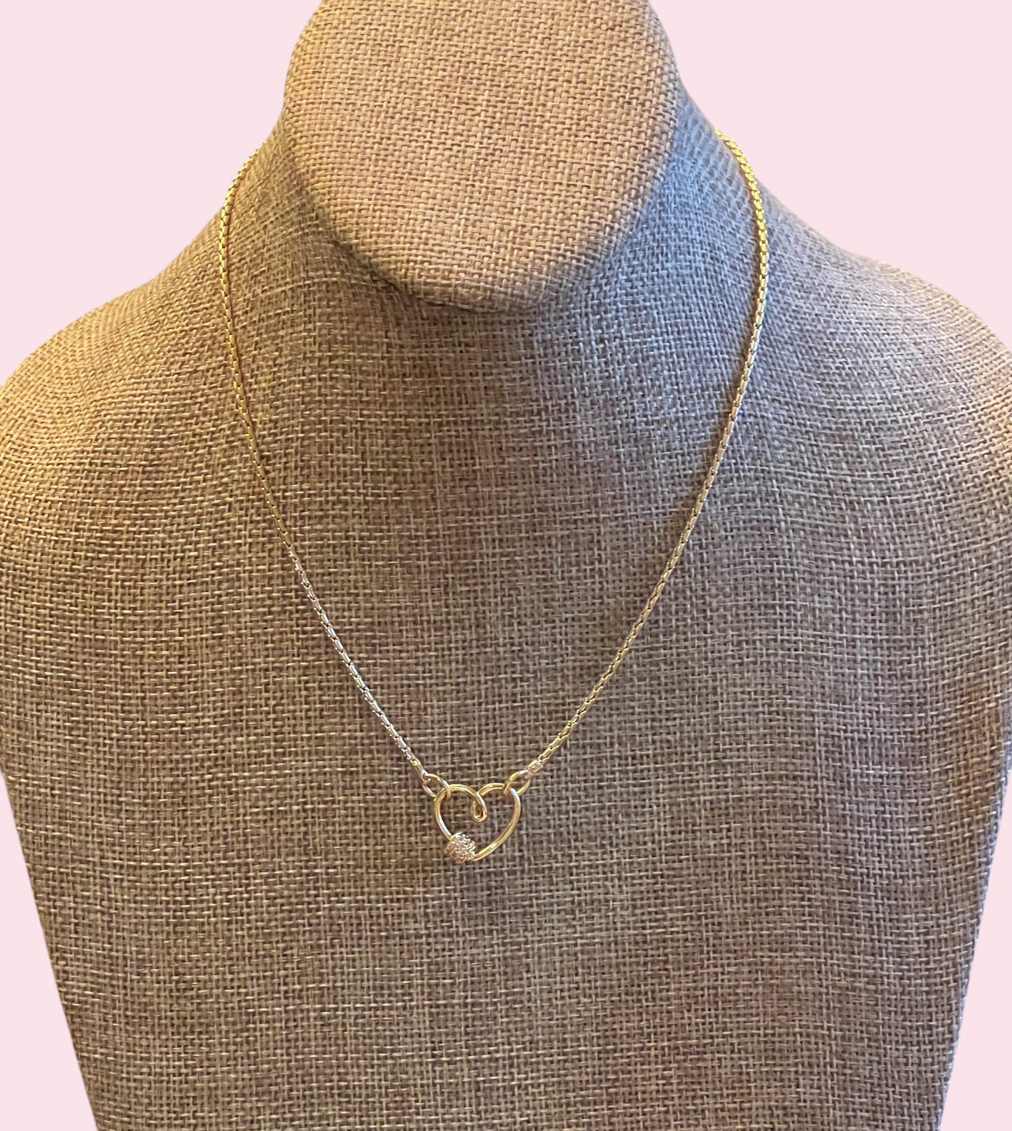 Be Still My Heart Necklace: A thin gold cable chain w/ an adorable heart that doubles as a clasp and a charm holder Pavé screw closure OOAK