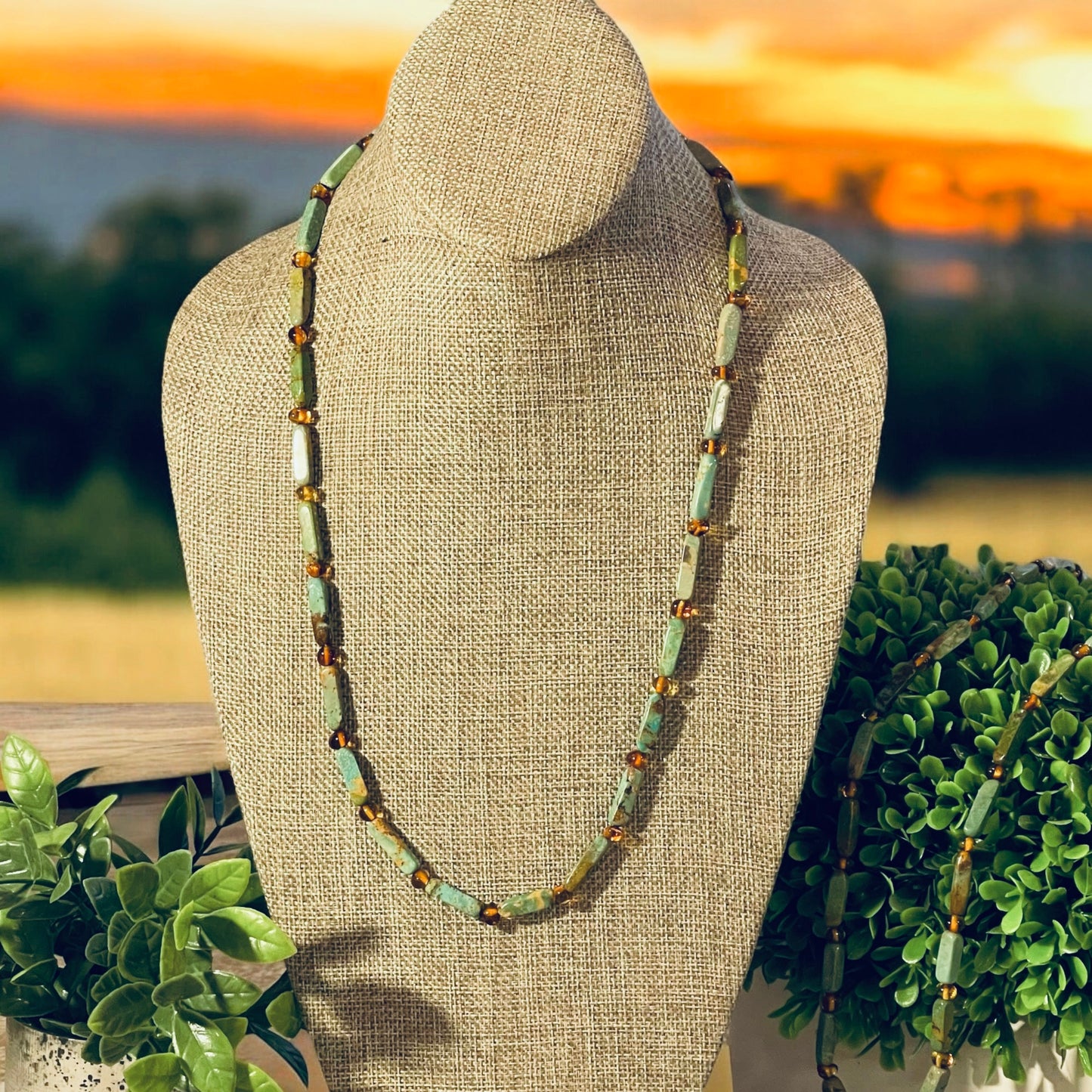 Verdant Glow Necklace: Turquoise and Baltic Amber stone with gold toggle clasp