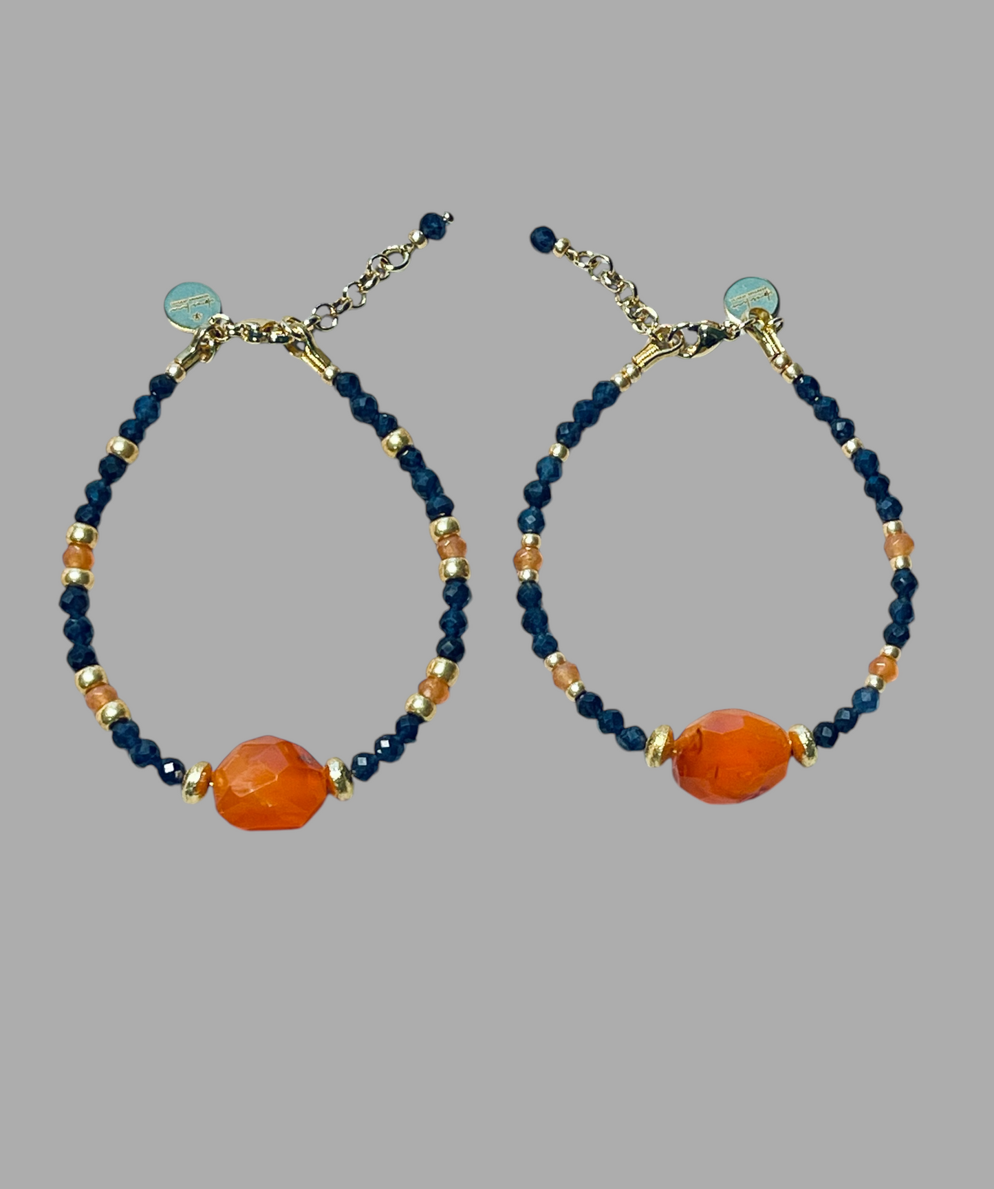 Fire & Twilight Bracelet~ Very Limited Edition: Faceted Sapphire beads Gold accent beads and a faceted Carnelian Centerpiece