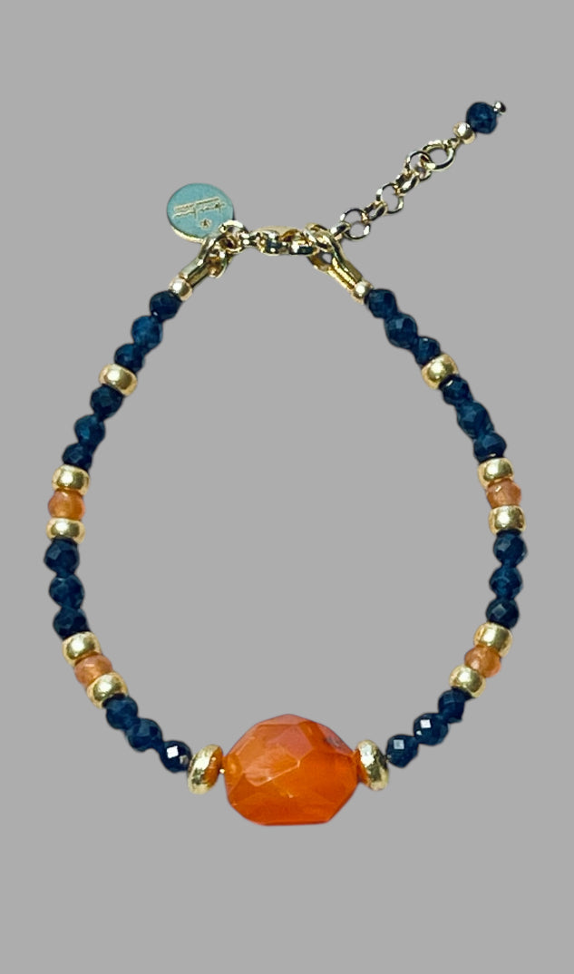 Fire & Twilight Bracelet~ Very Limited Edition: Faceted Sapphire beads Gold accent beads and a faceted Carnelian Centerpiece