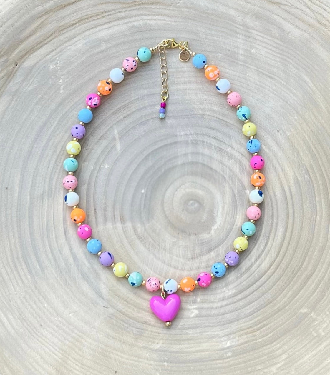 Color Confetti Necklace: Acrylic beads, gold spacer beads and a hot pink acrylic heart pendant