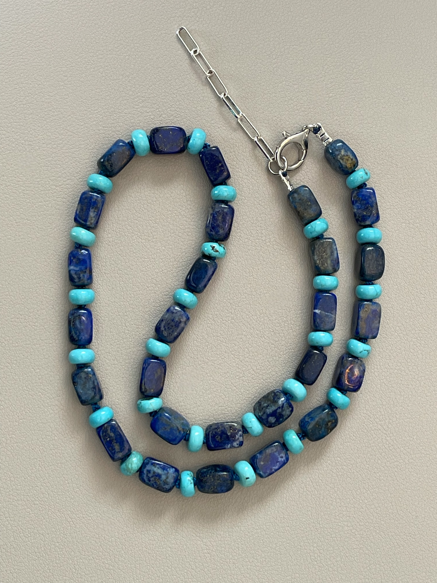 The Catherine Necklace: Gorgeous Lapis Lazuli barrel shaped beads hand knotted on silk w Turquoise accent beads Silver clasp