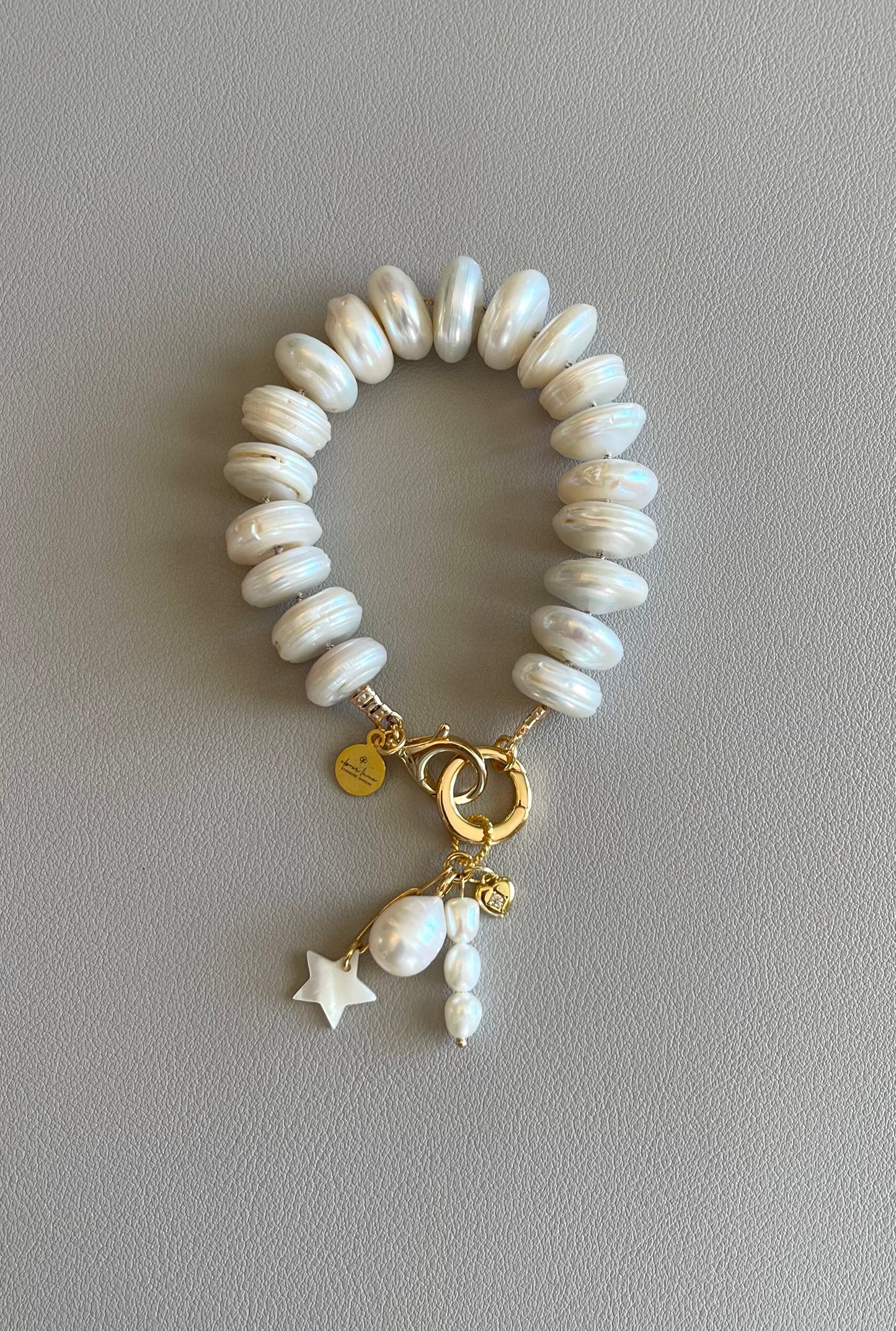 The Haven Bracelet: Coin shaped Pearls Hand-knotted on silk, Gold filled clasp/charm holder