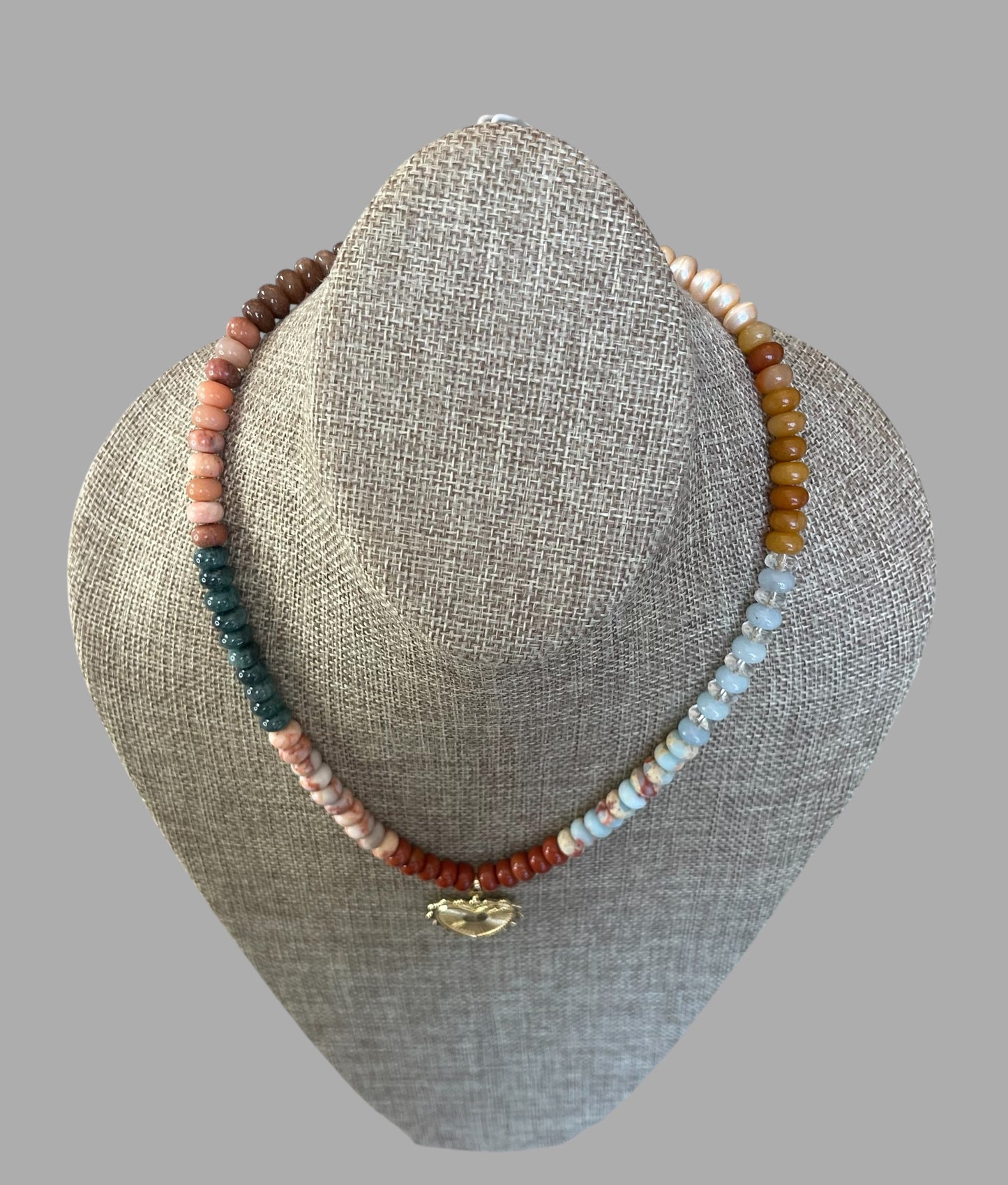Earth & Sky Necklace: A blend of natural stones with a gold removable heart charm