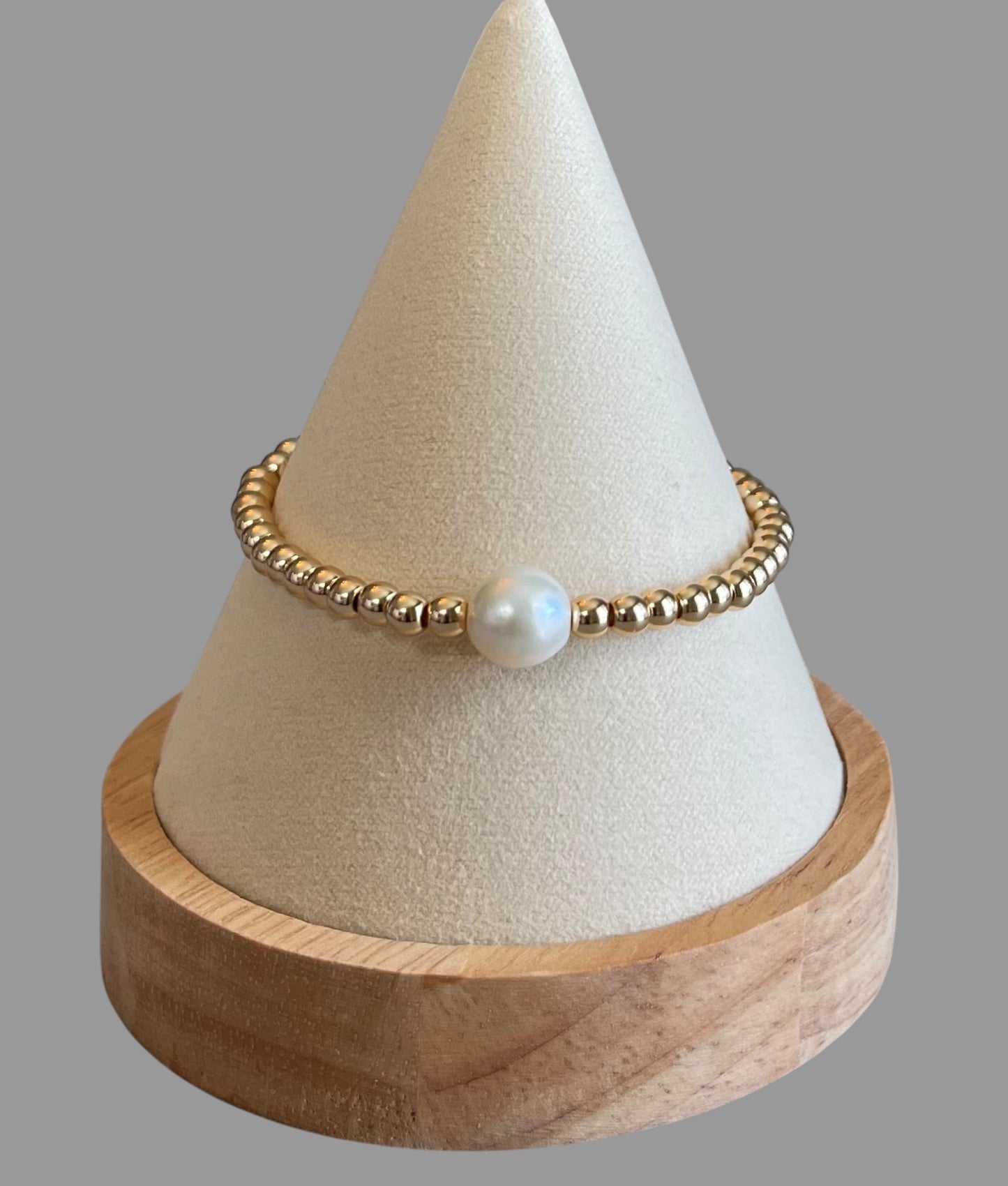 Everyday Hero Bracelet: Gold bead stretch bracelet with a freshwater pearl centerpiece Choose your size!