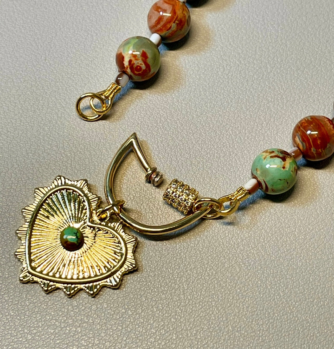 Heirloom Heart Necklace: Red Copper & Sage Agate beads with Green accent stones and a heart pendant
