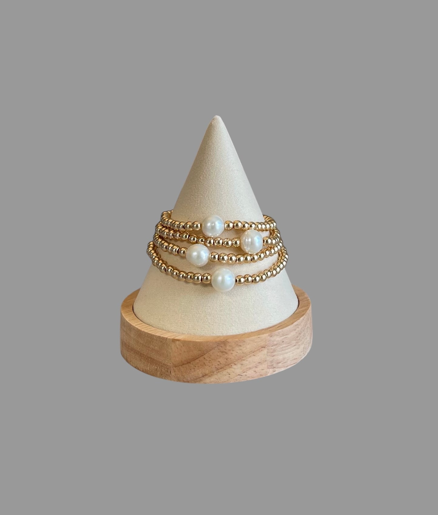Everyday Hero Bracelet: Gold bead stretch bracelet with a freshwater pearl centerpiece Choose your size!