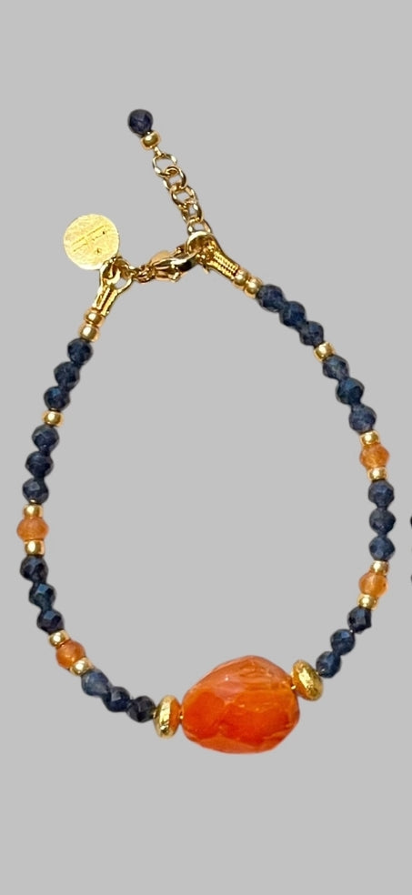 Fire & Twilight Bracelet~ Very Limited Edition: Faceted Sapphire beads Gold accent beads and a faceted Carnelian Centerpiece