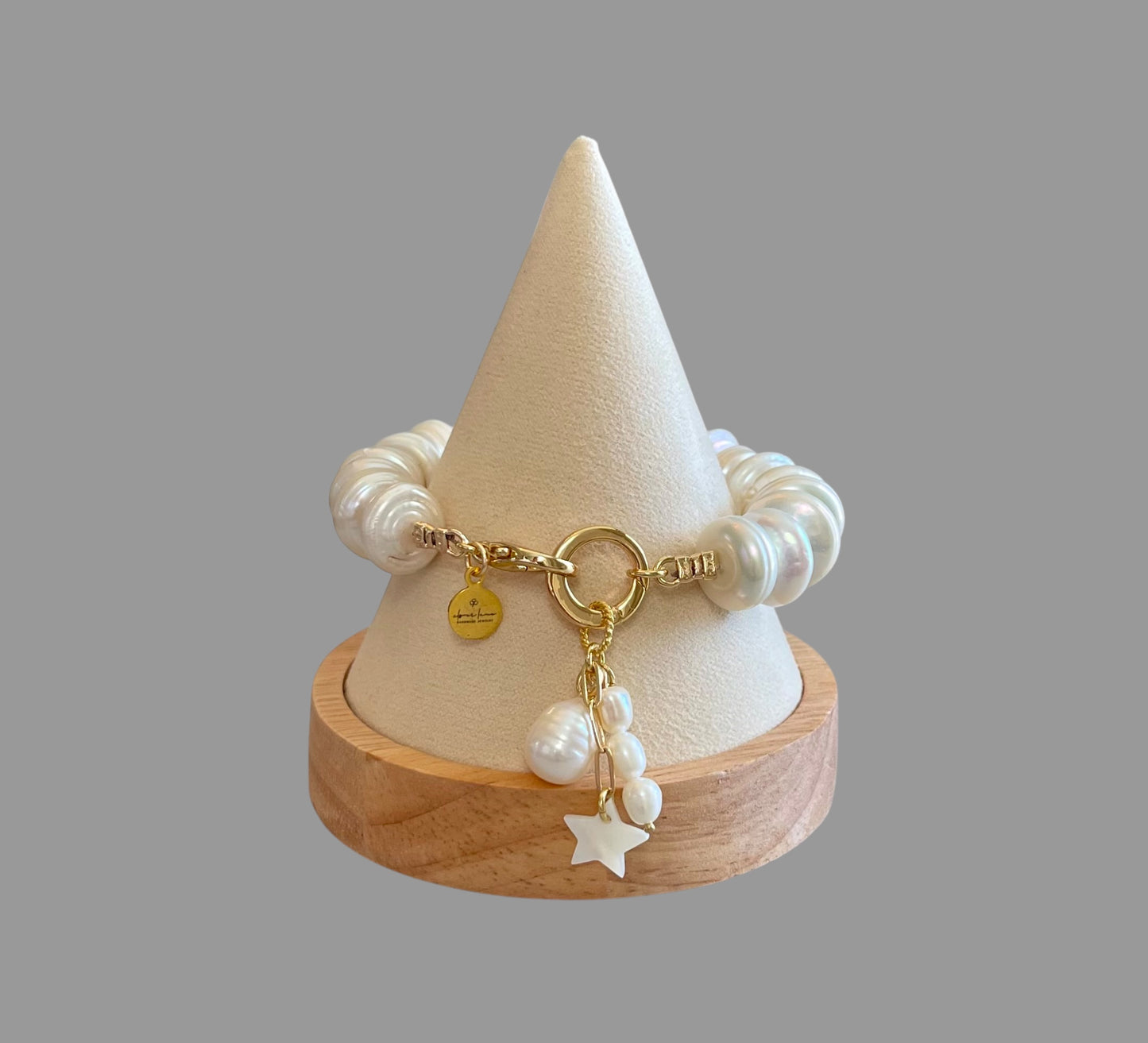The Haven Bracelet: Coin shaped Pearls Hand-knotted on silk, Gold filled clasp/charm holder