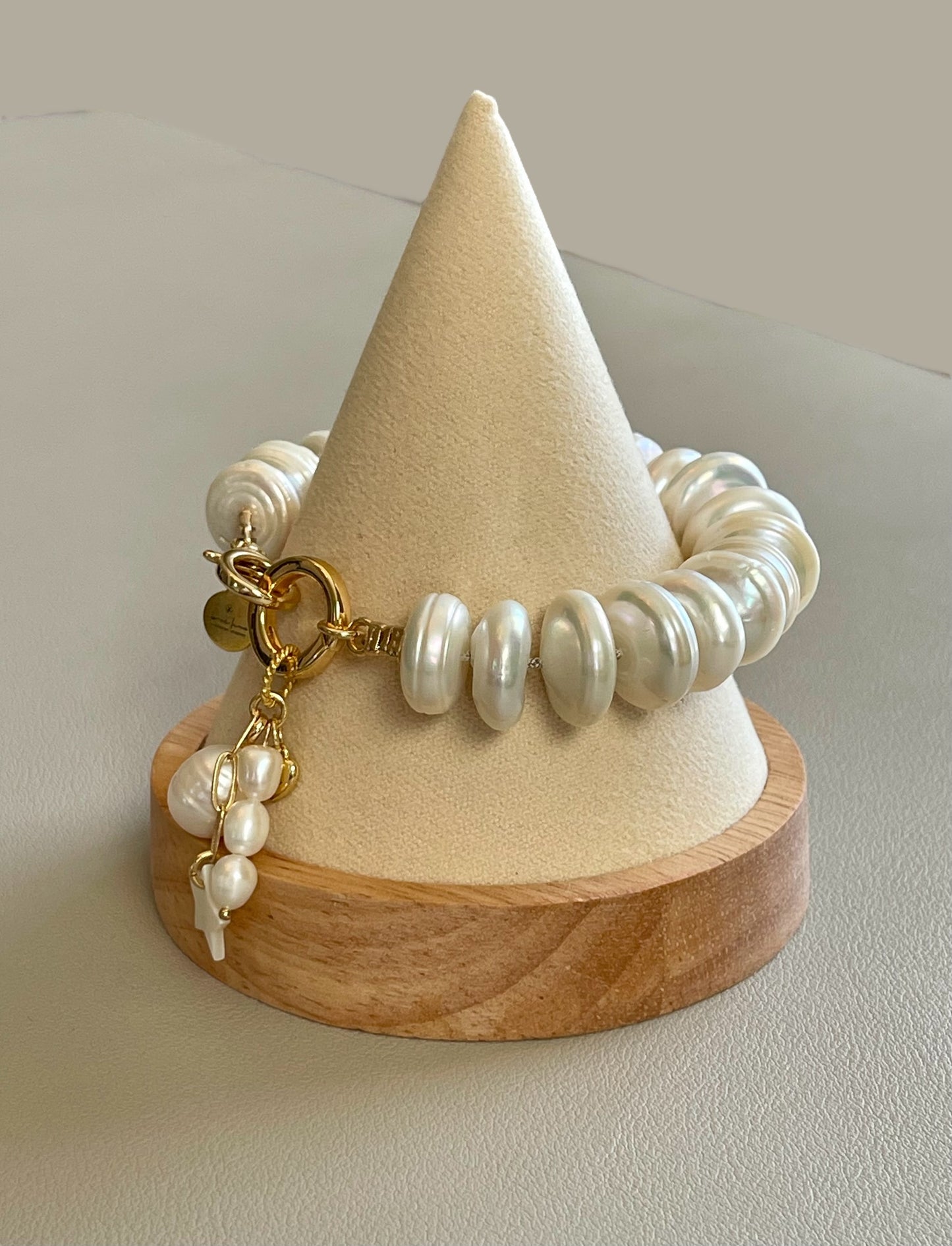 The Haven Bracelet: Coin shaped Pearls Hand-knotted on silk, Gold filled clasp/charm holder