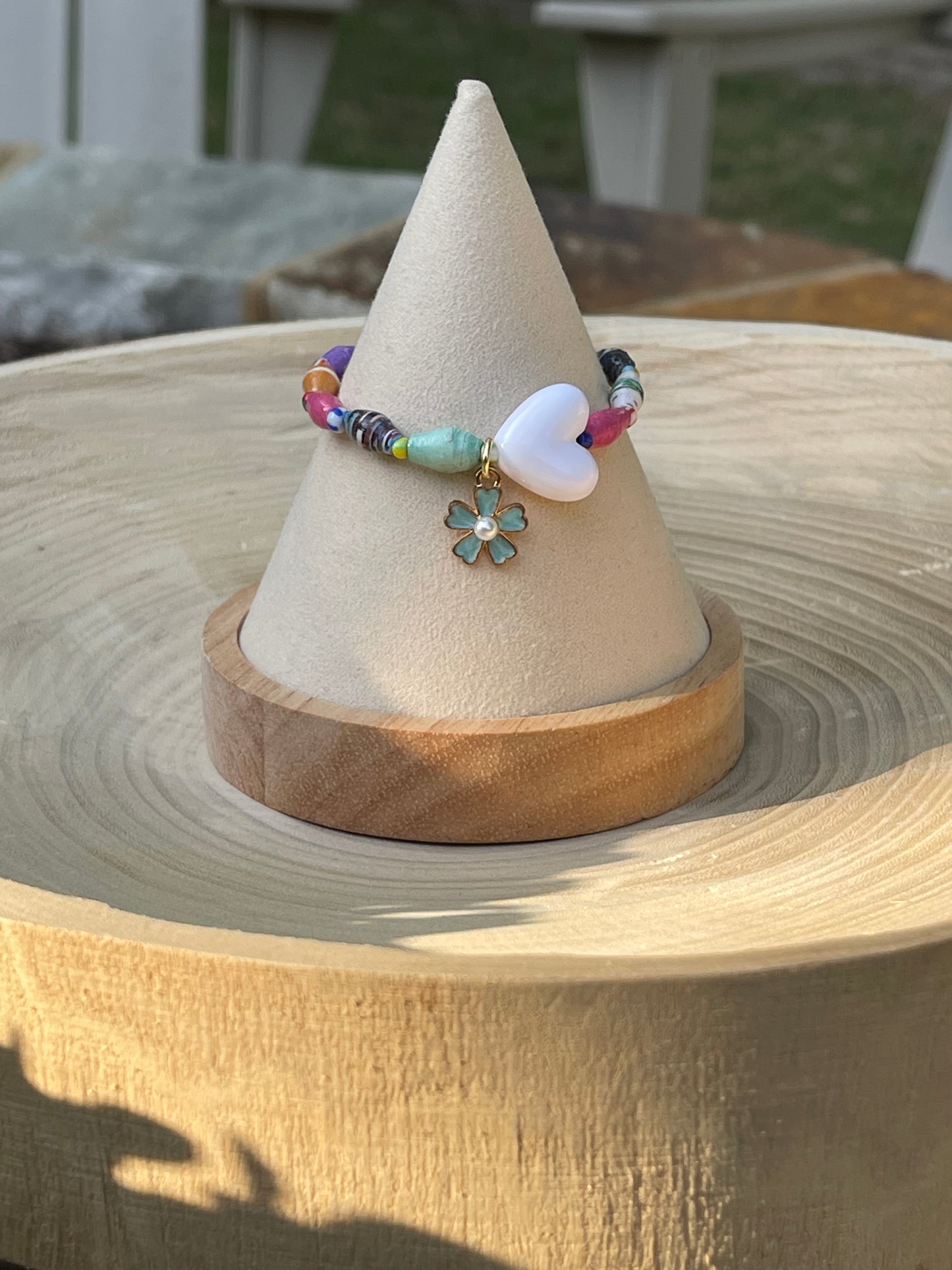 Kindred Colors Bracelet: Recycled paper bicone shaped beads, glass spacer beads, shiny white heart and flower charm