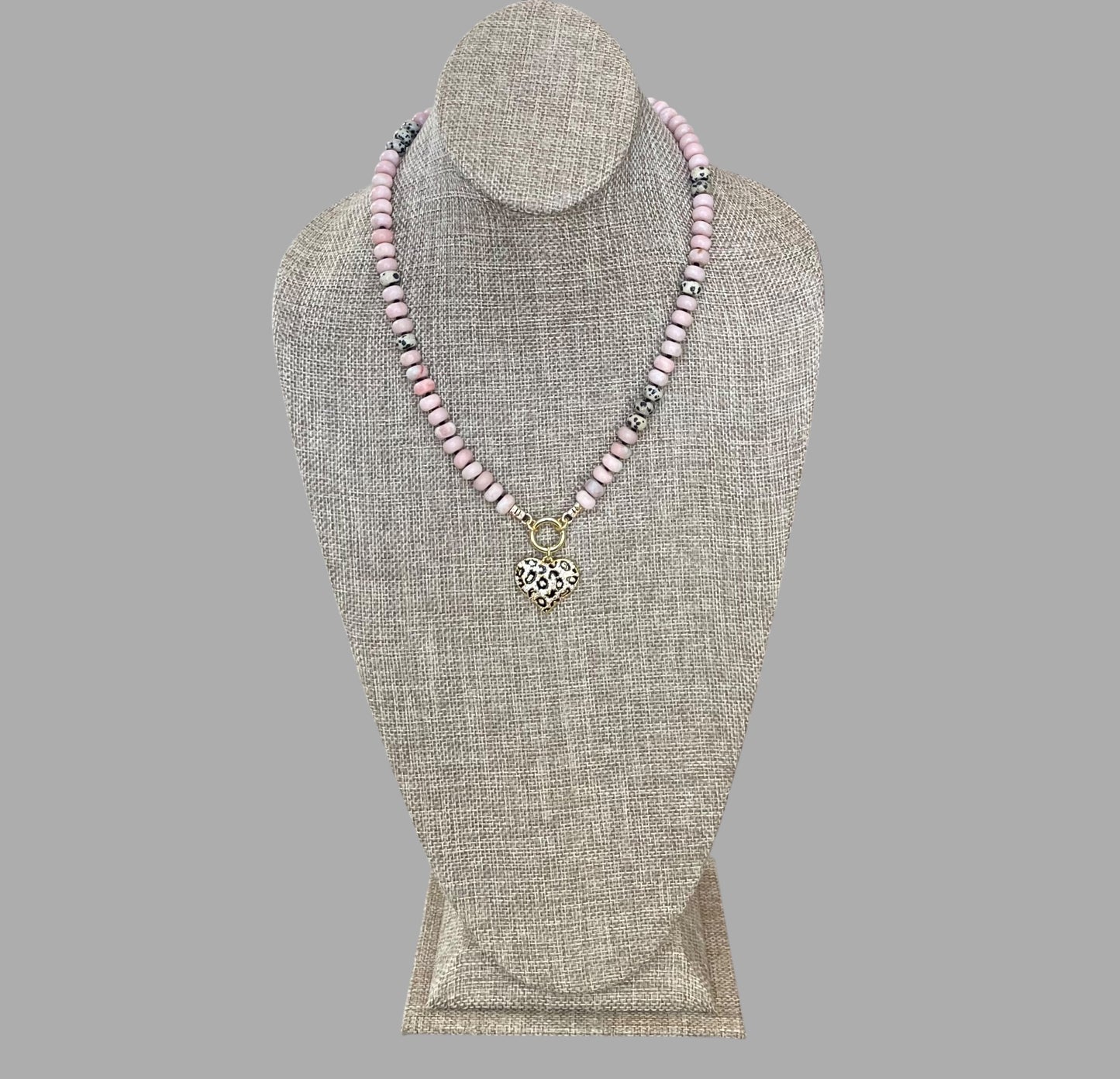 The Pink Leopard Necklace: Natural matte pink opals hand knotted on black silk w Dalmatian Jasper accents Gold pavé leopard heart OOAK