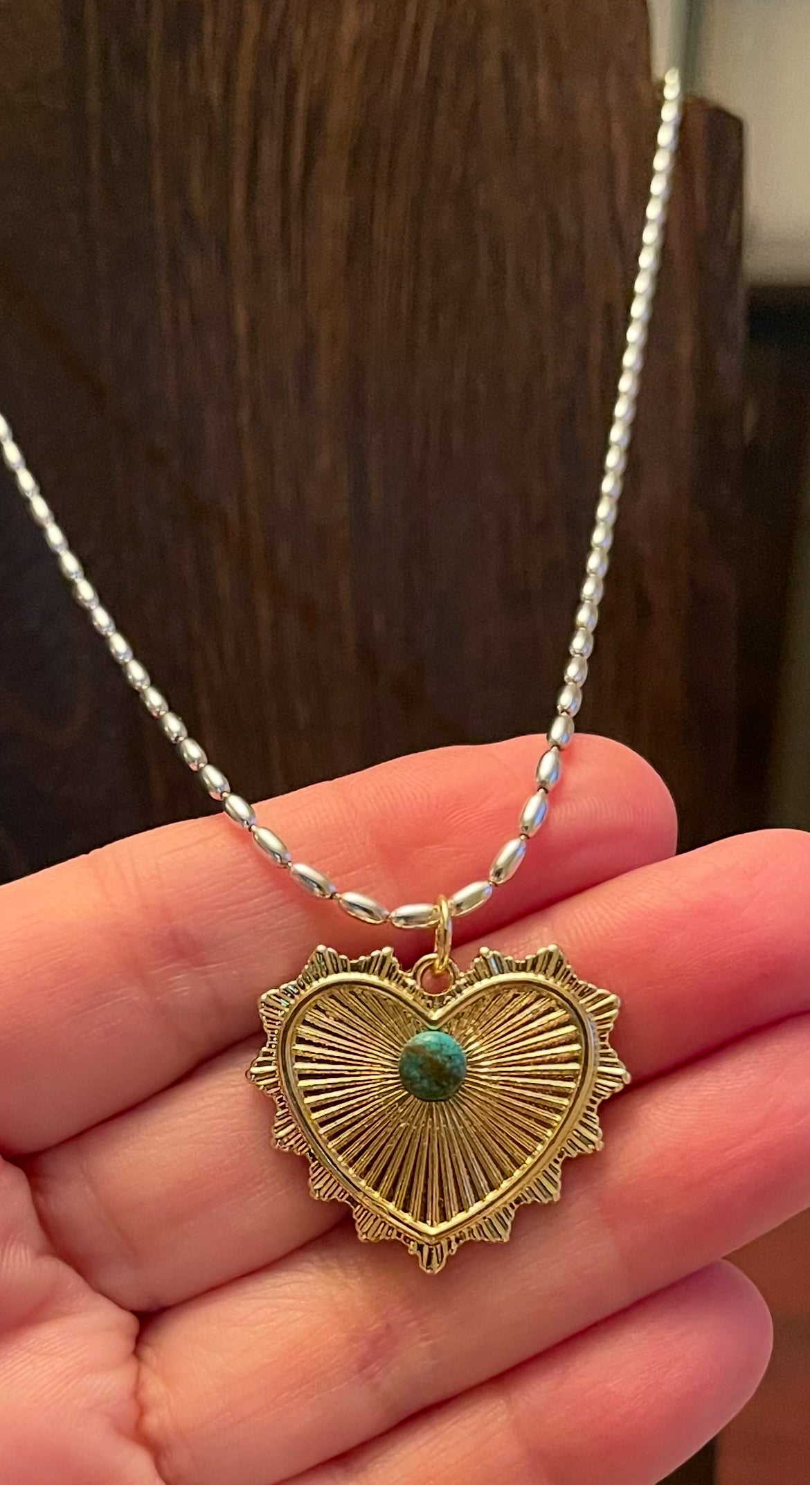The Sierra Necklace: OOAK Sterling Silver rice shaped chain with a gold heart pendant sporting a genuine turquoise stone centerpiece