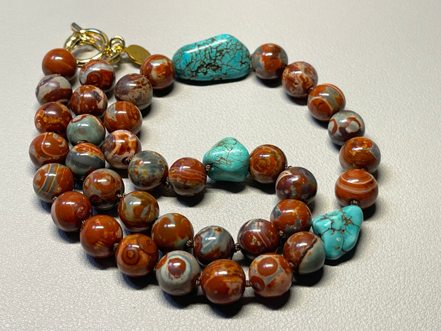 Red Copper & Turquoise Necklace: Hand knotted on brown silk, Natural Agate beads and rustic Turquoise, Gold Toggle clasp OOAK