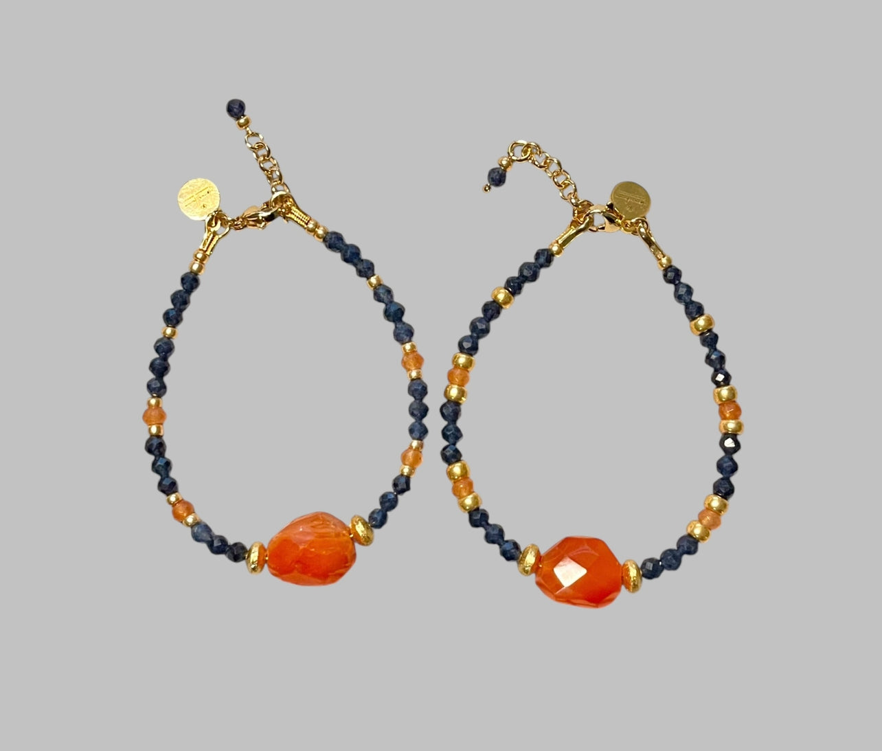 Fire & Twilight Bracelet~ Very Limited Edition: Faceted Sapphire beads Gold accent beads and a faceted Carnelian Centerpiece