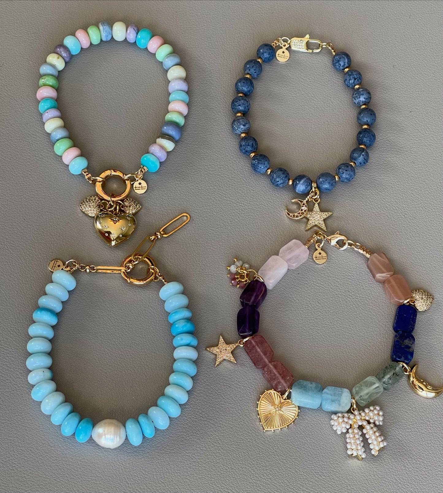 Robin’s Egg Opal Bracelet: Robin’s egg blue Opals with a Baroque Pearl center Gold clasp