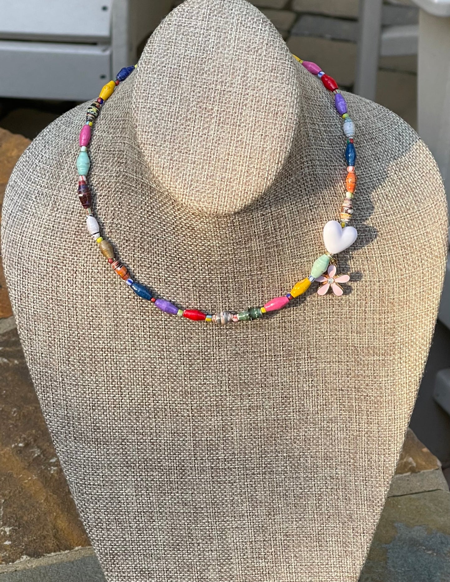Kindred Colors Necklace: Unique beads handmade in Uganda from recycled paper, glass & acrylic accent beads and a brass flower charm
