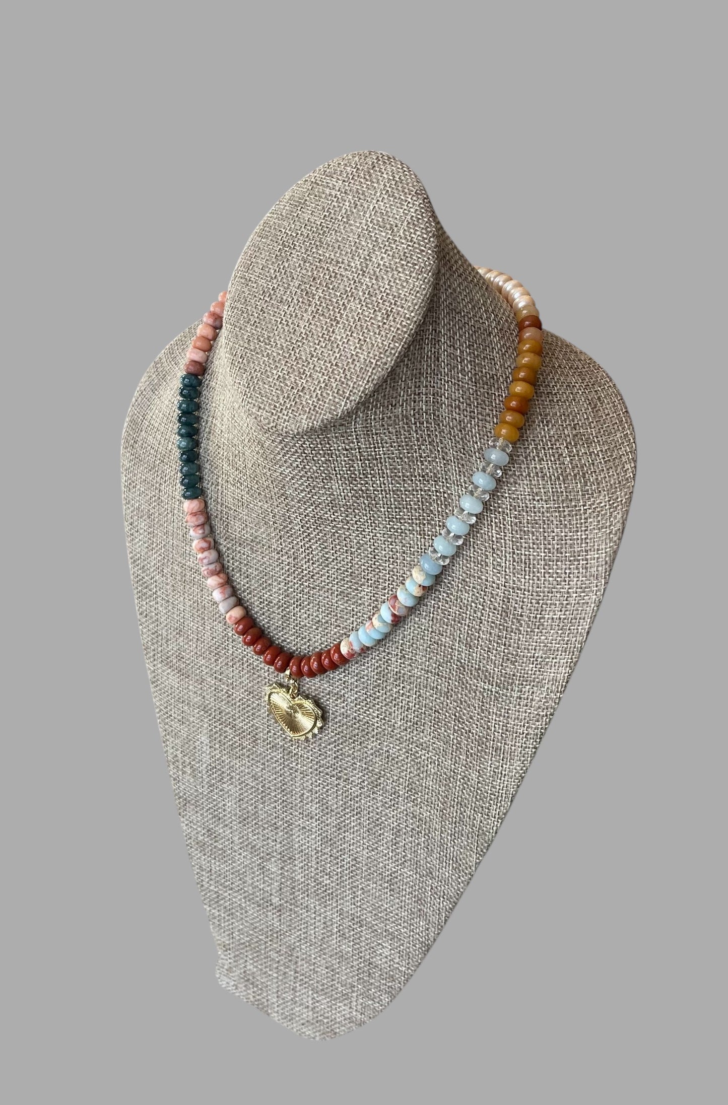 Earth & Sky Necklace: A blend of natural stones with a gold removable heart charm