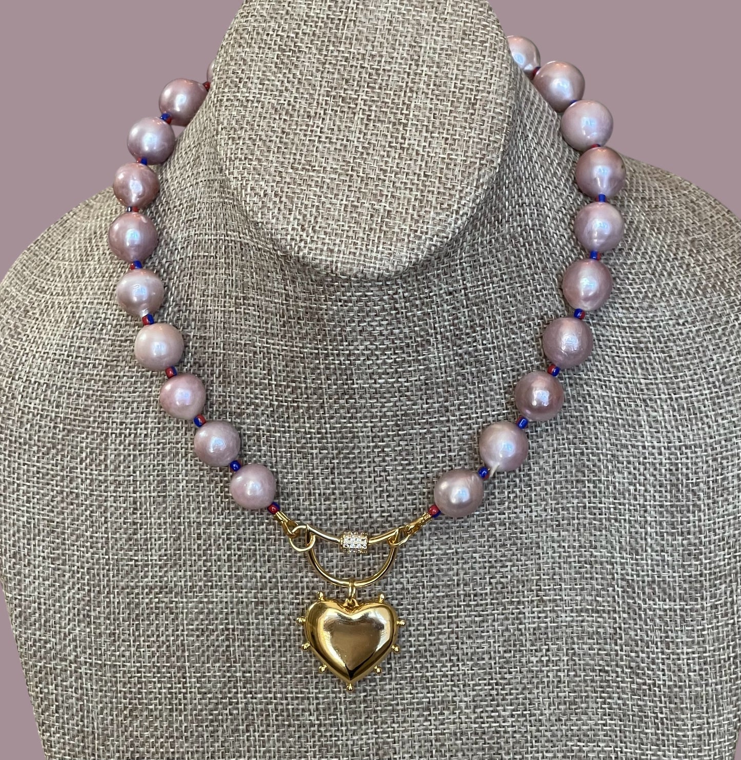 The Yves Necklace: Lavender Edison Pearls w/glass spacers, a gold crescent clasp holding a heart pendant OOAK