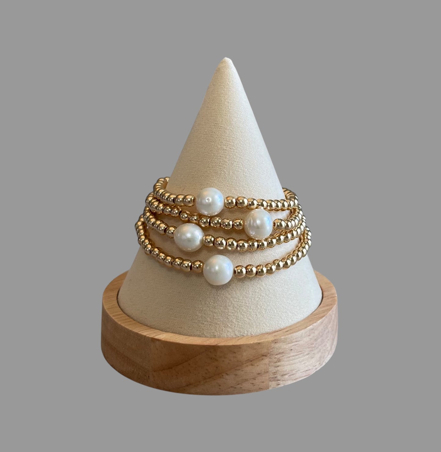 Everyday Hero Bracelet: Gold bead stretch bracelet with a freshwater pearl centerpiece Choose your size!