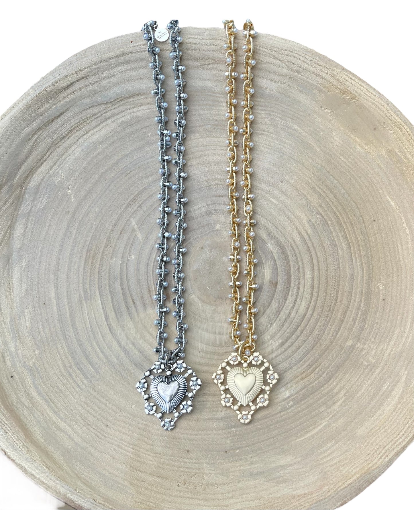Bold Bijoux in Gold Necklace: Matte gold throughout Tiny pearls Statement heart