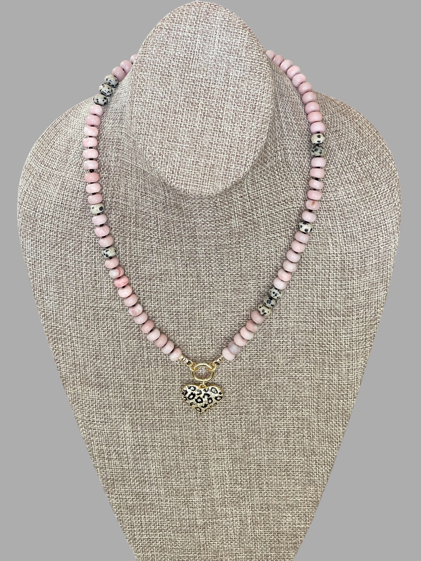 The Pink Leopard Necklace: Natural matte pink opals hand knotted on black silk w Dalmatian Jasper accents Gold pavé leopard heart OOAK