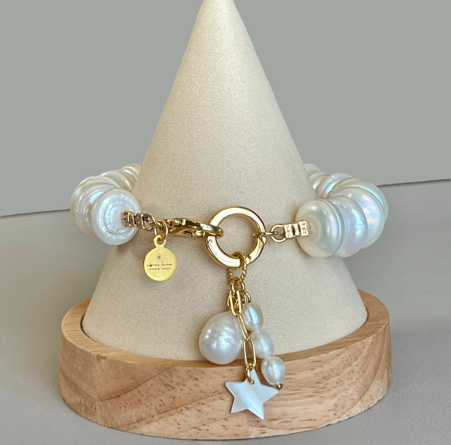 The Haven Bracelet: Coin shaped Pearls Hand-knotted on silk, Gold filled clasp/charm holder