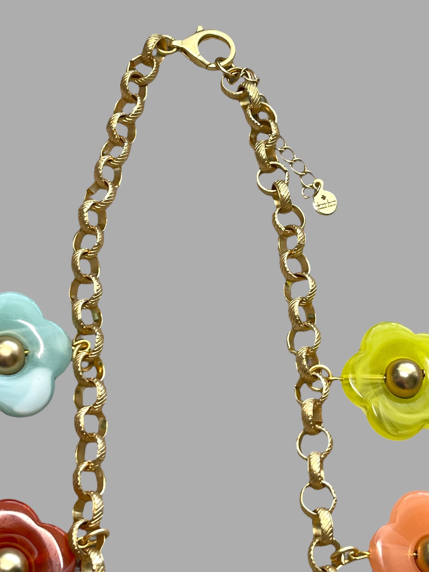 Bloom Necklace: Acrylic flowers with brushed gold centers on a brushed gold Rolo chain